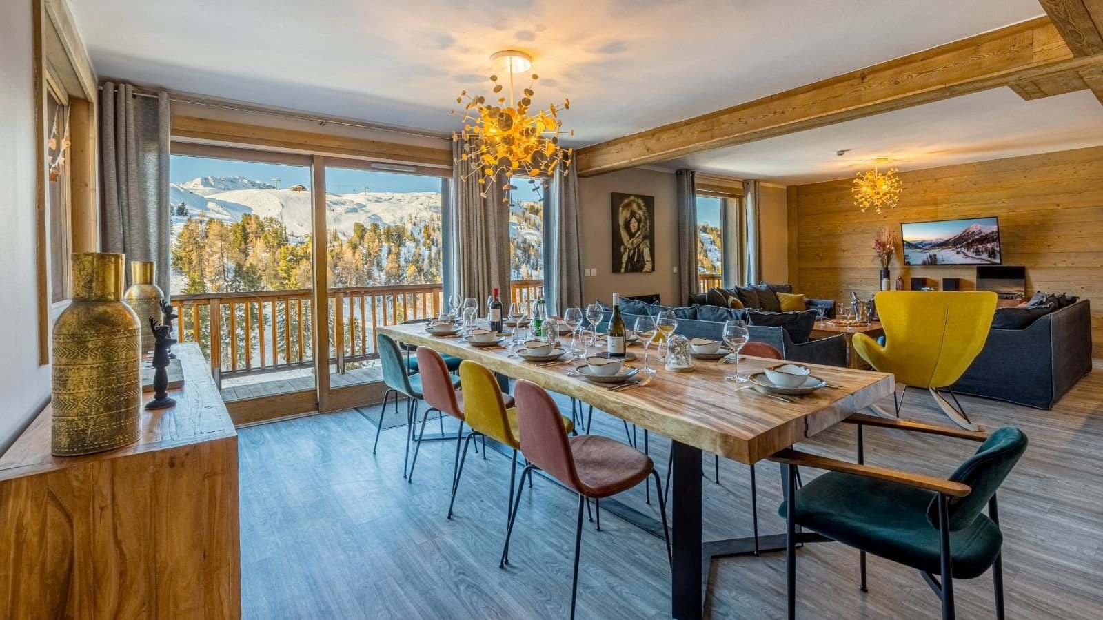 Dining area with seating for 10 and mountain views via balcony access