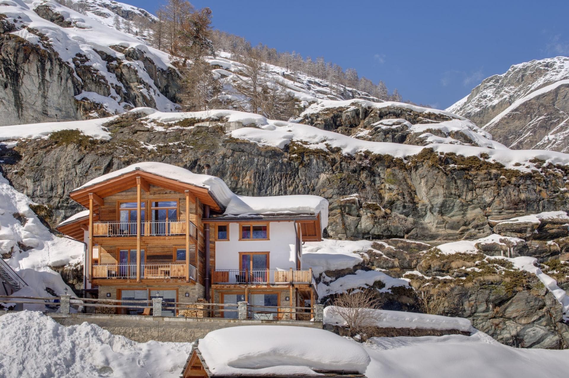 Ski-in chalet with mountain views and private balconies on every level
