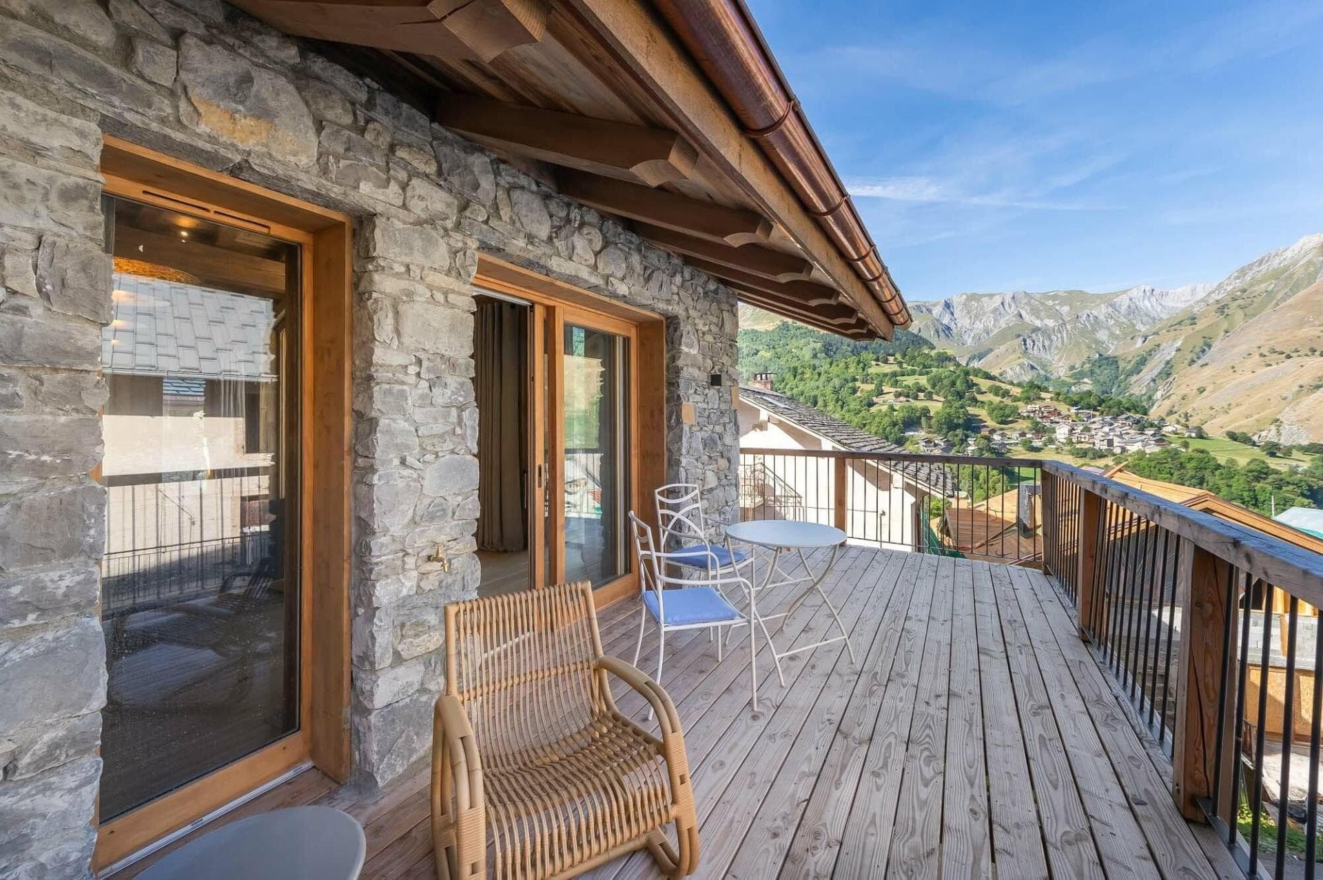 Private balcony with valley views and bistro seating for three