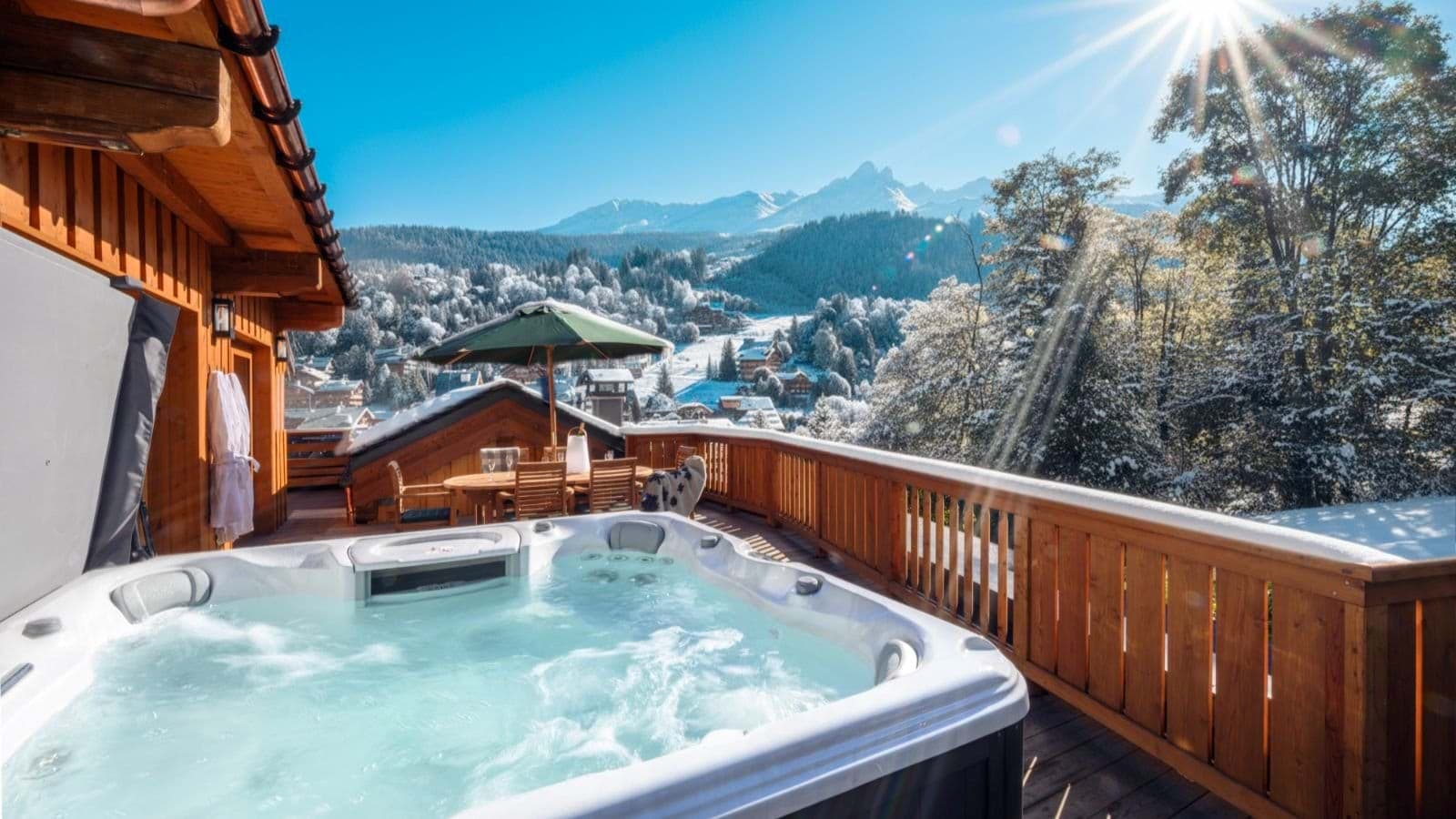 Hot tub and dining for 4 with snowy mountain views