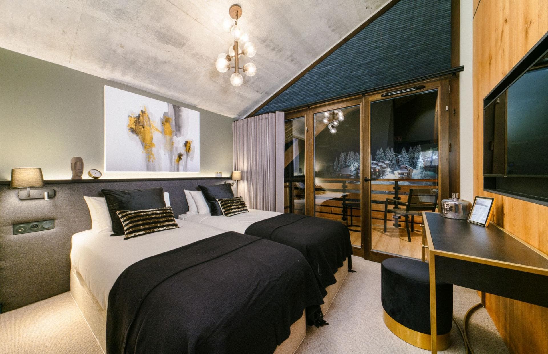 Guest bedroom with twin beds and private balcony access