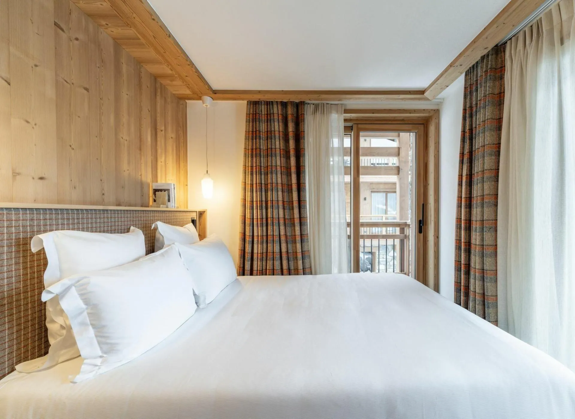 Double bedroom with balcony doors