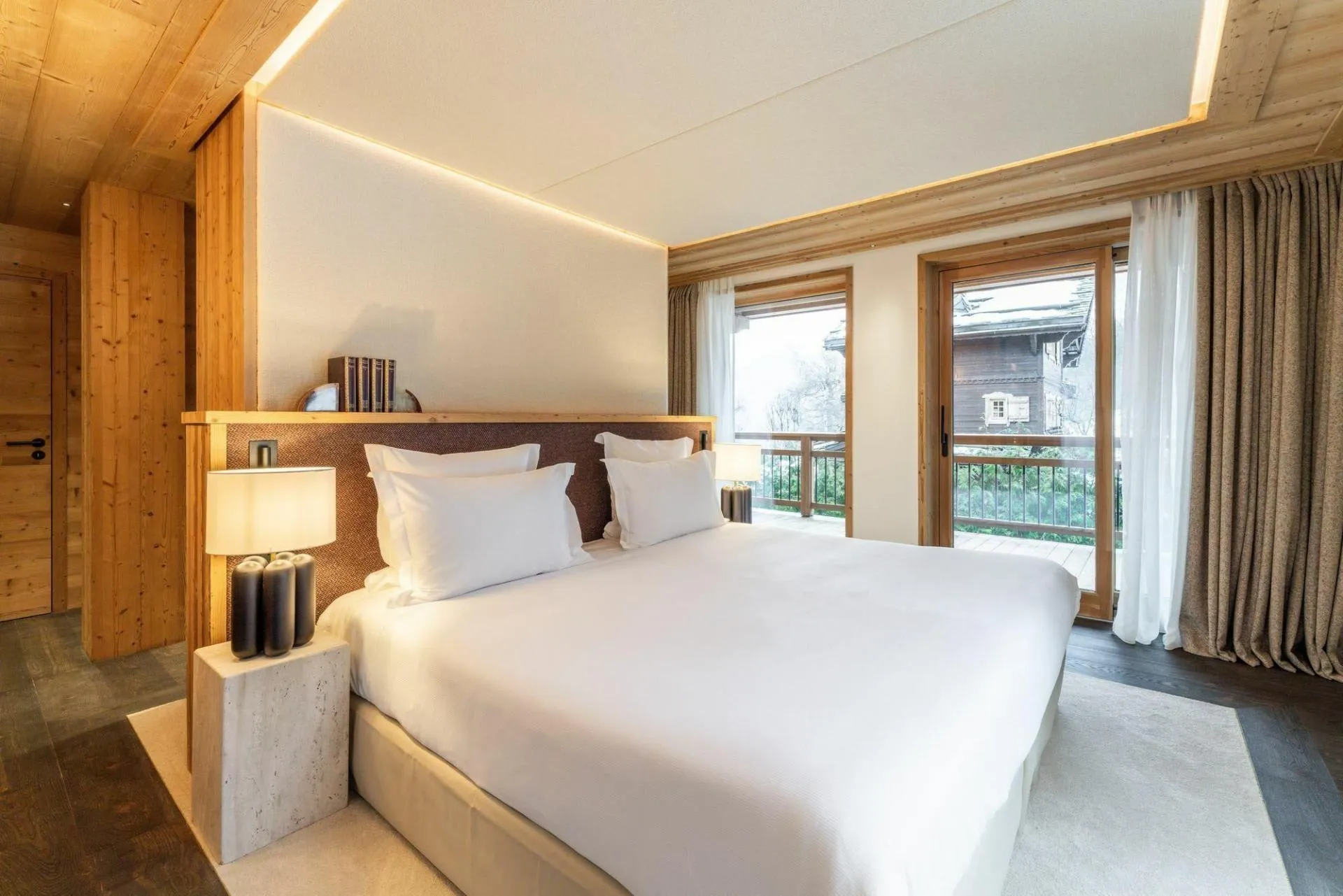 Double bedroom with balcony doors and built-in storage