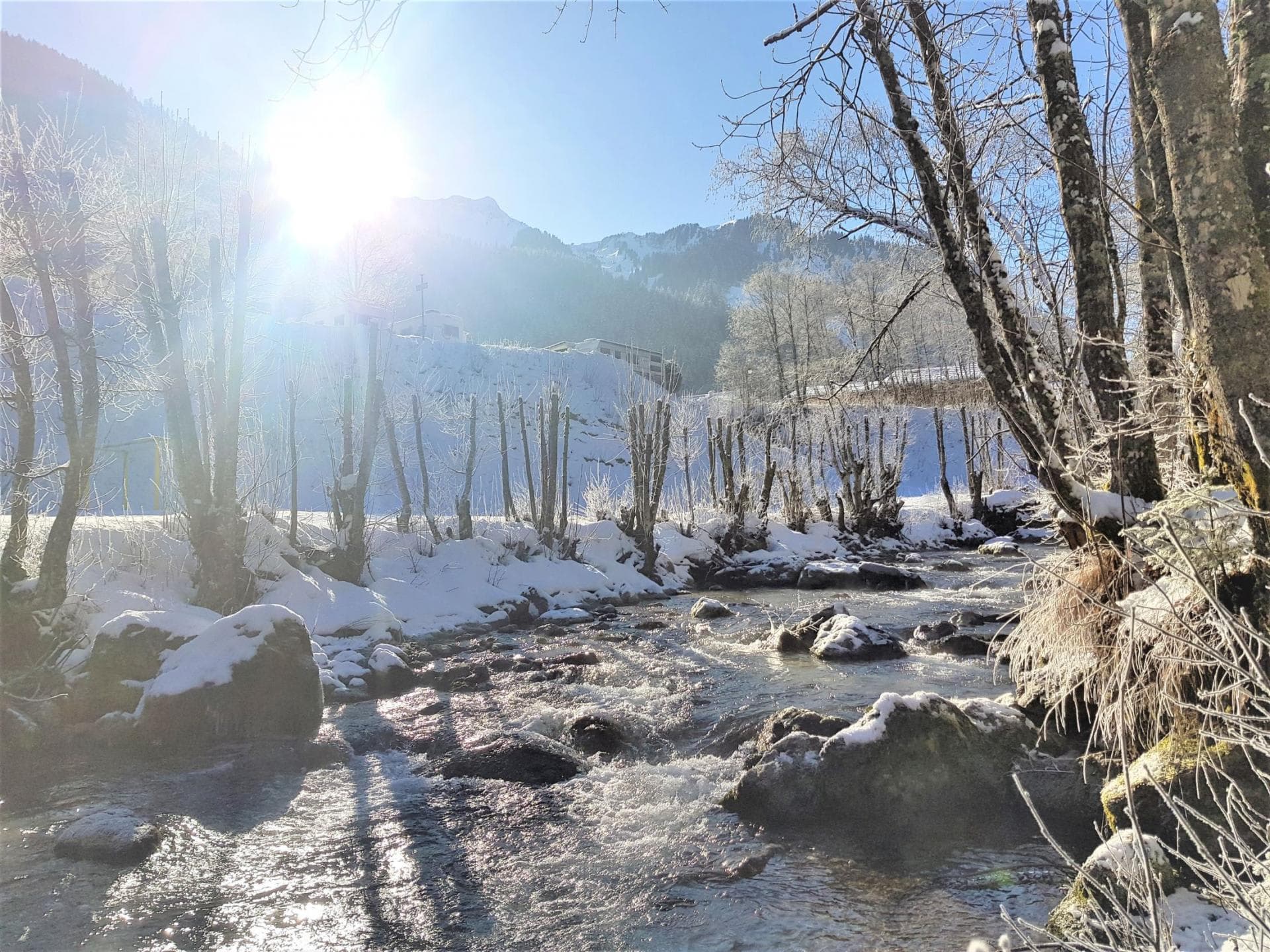 Creek access on property with mountain views and winter snow