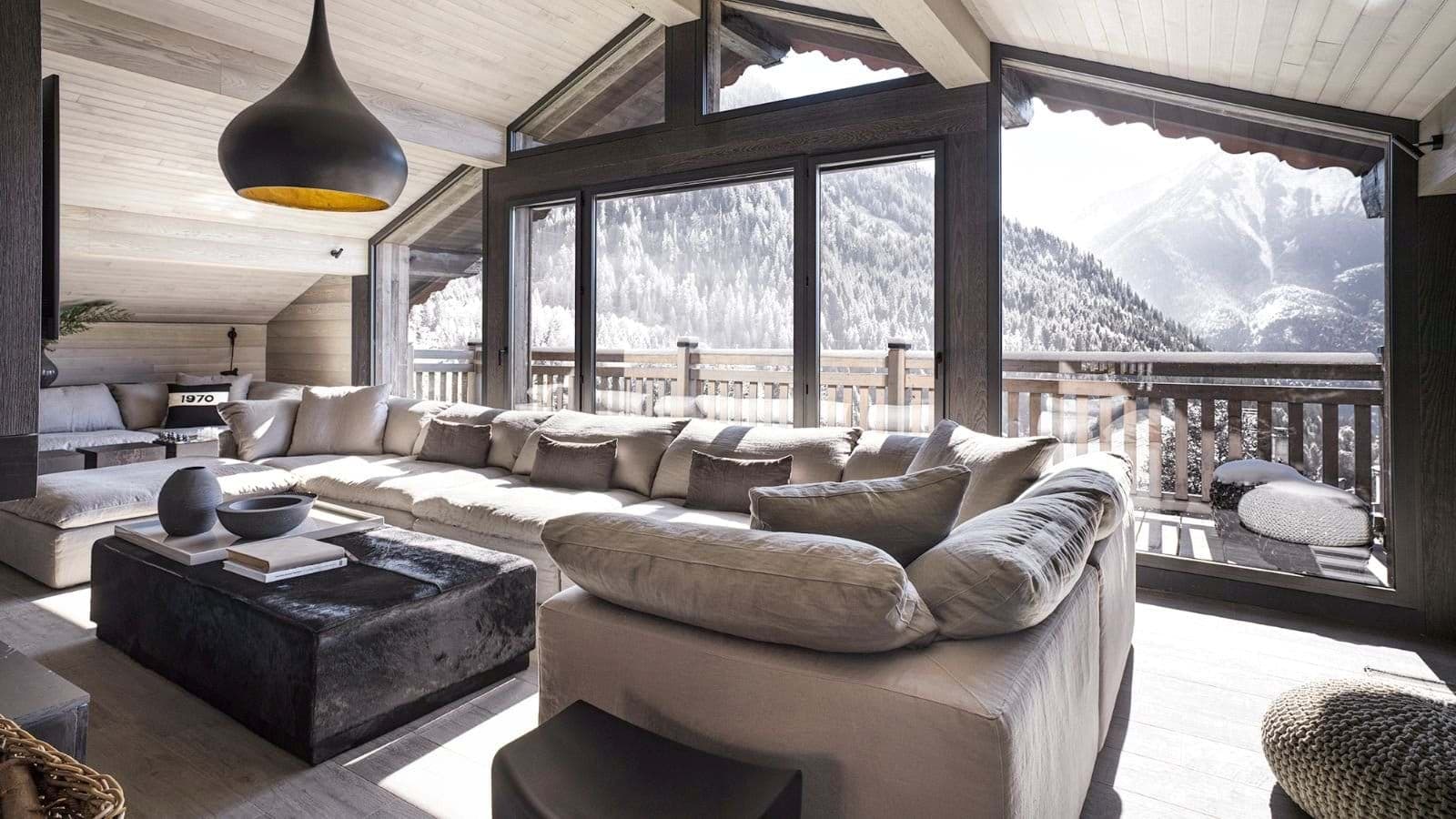 Living area with sectional seating for 10 and mountain views