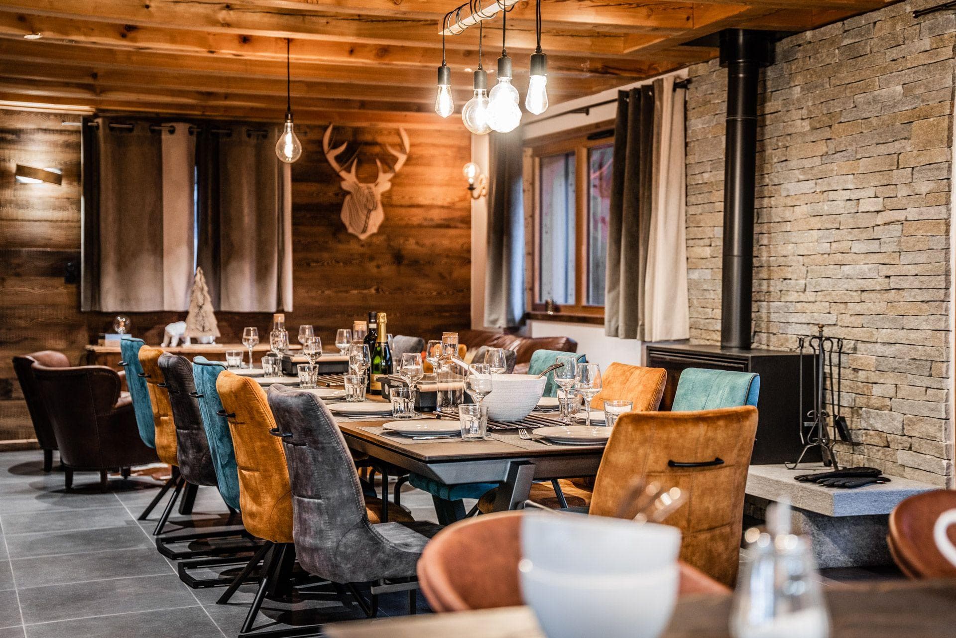 Dining area with seating for 10 and wood-burning stove