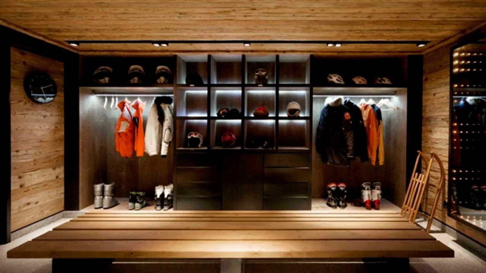 Ski boot room with storage lockers and integrated gear drying racks