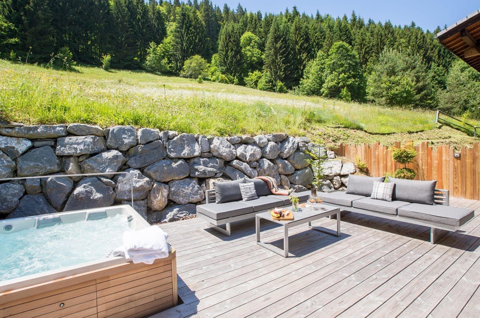 Private deck with sunken hot tub and seating for six