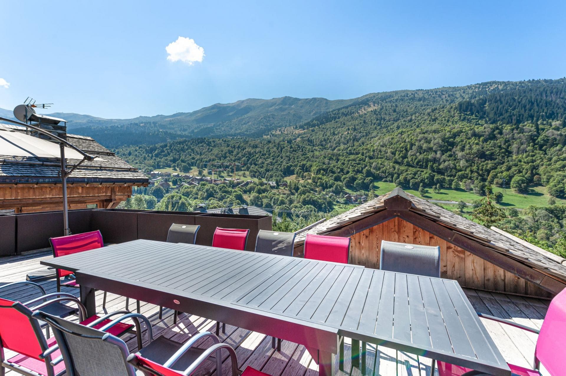Private deck with dining for 8 and mountain valley views