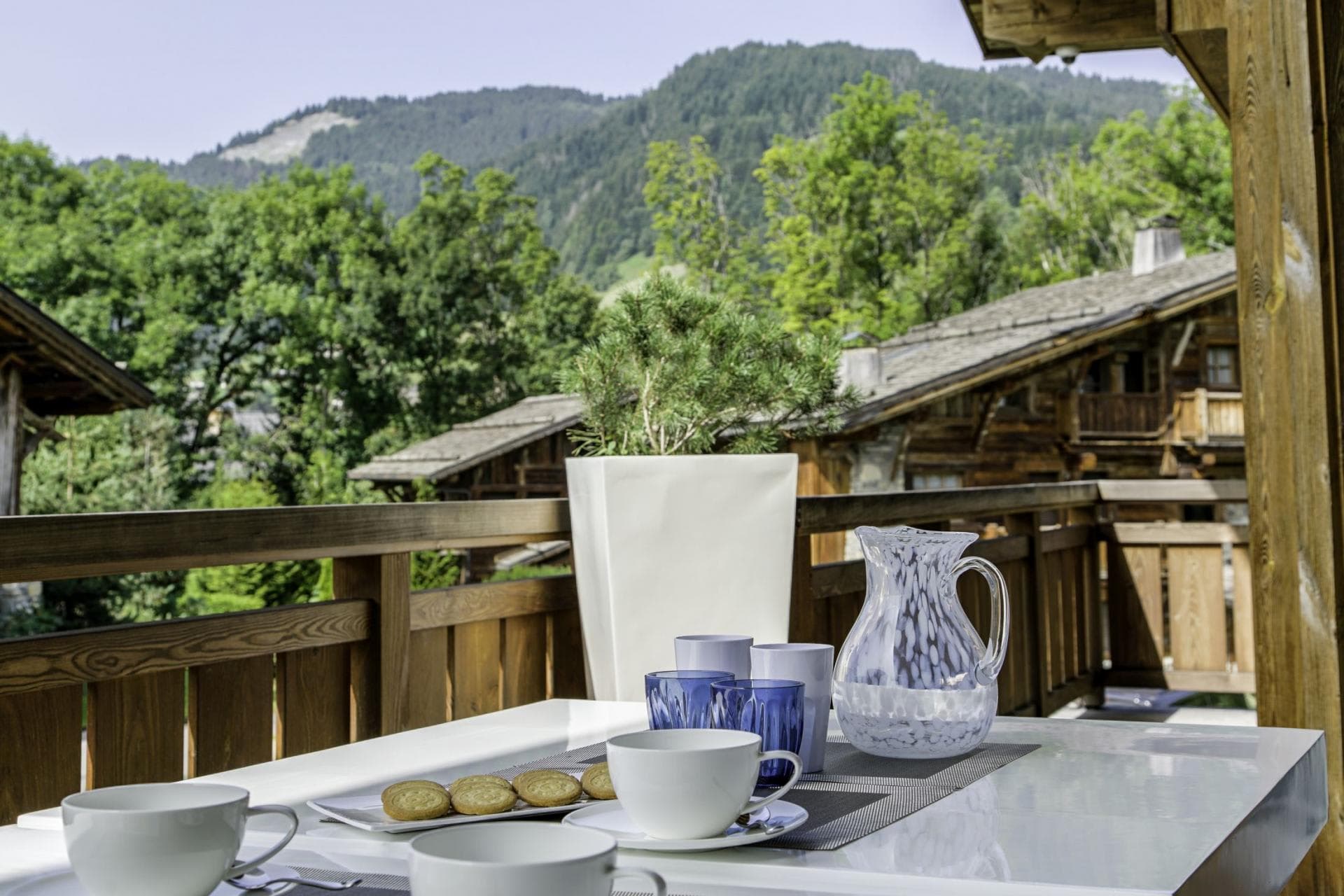 Private balcony with mountain views and outdoor dining table