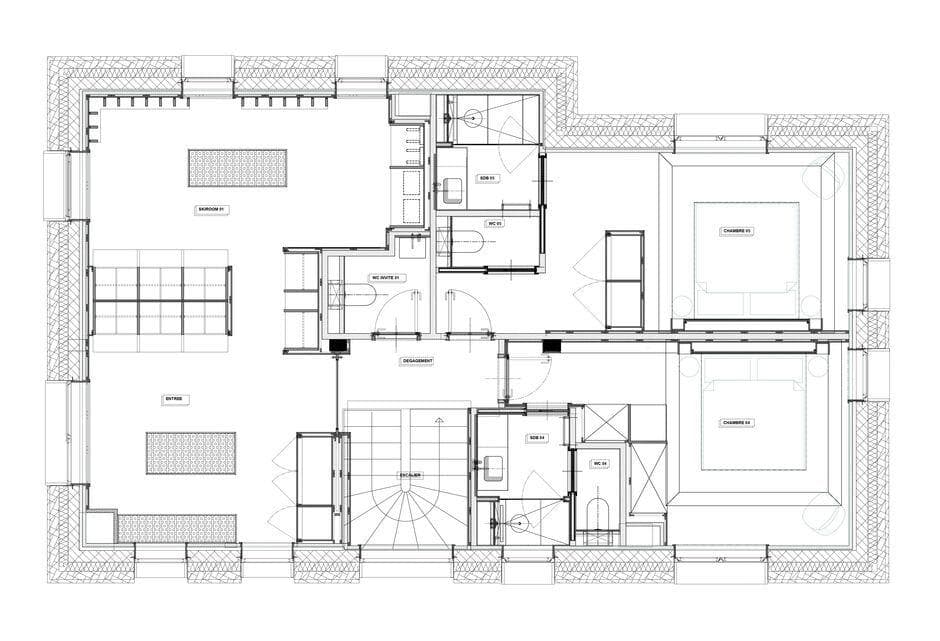 Ground floor plan: entry, ski room with storage, and two ensuite bedrooms