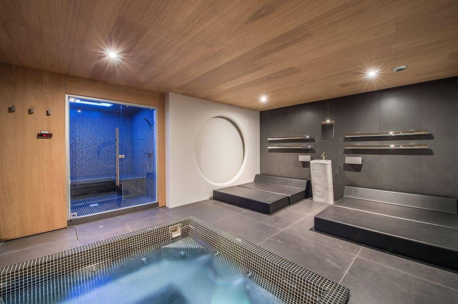 Private spa with steam room, hot tub, and heated loungers