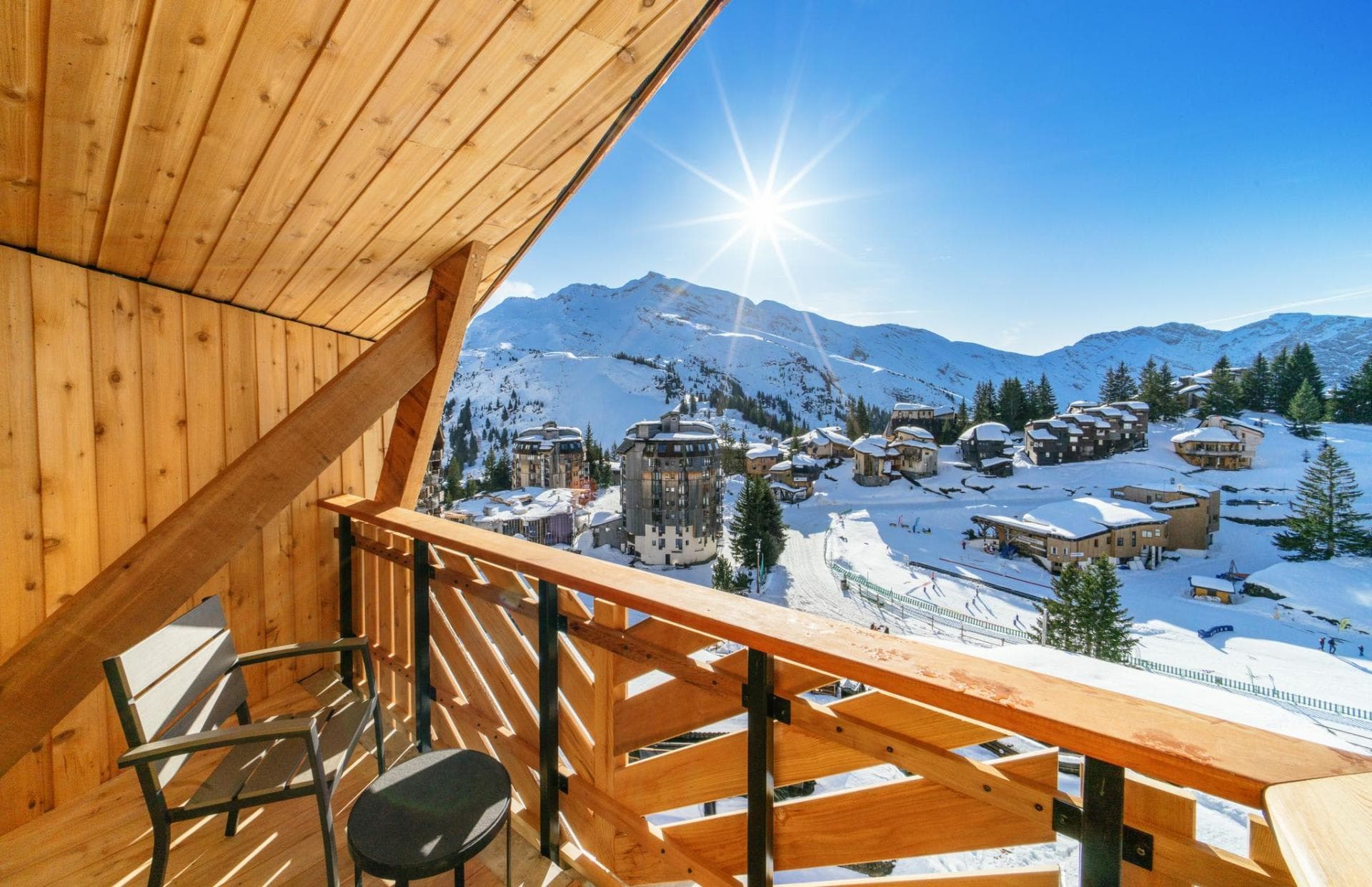 Private balcony with mountain views and ski-in/ski-out village access