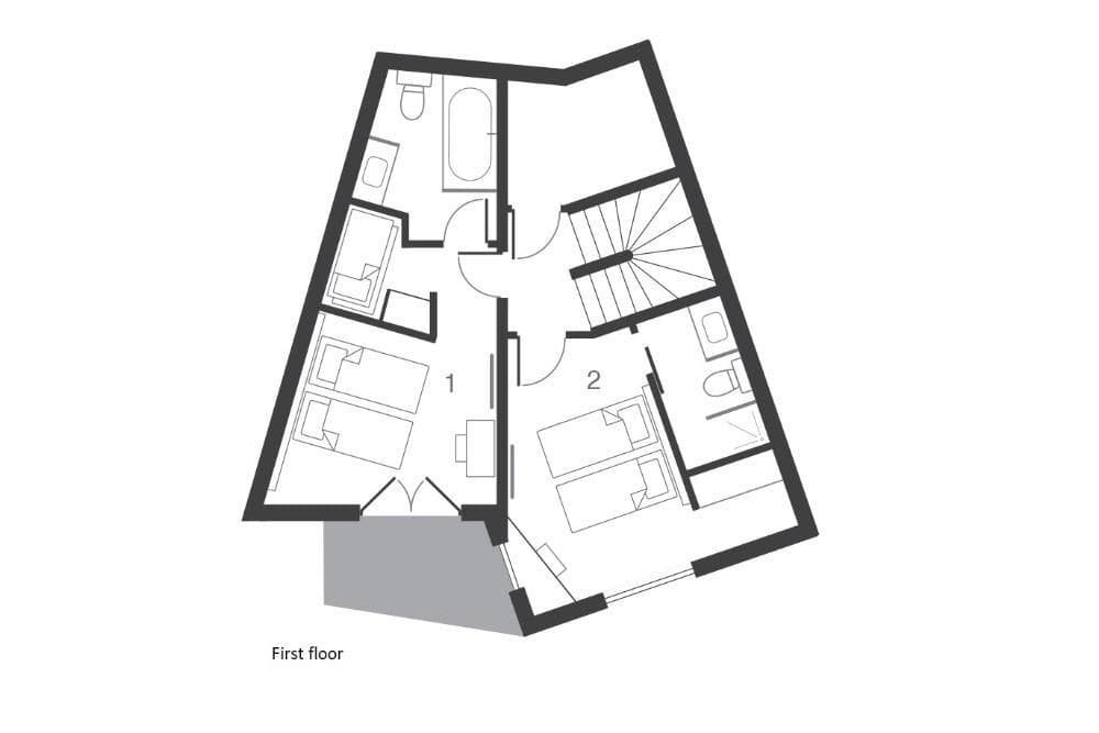 First floor layout: two bedrooms, two bathrooms, and outdoor balcony access
