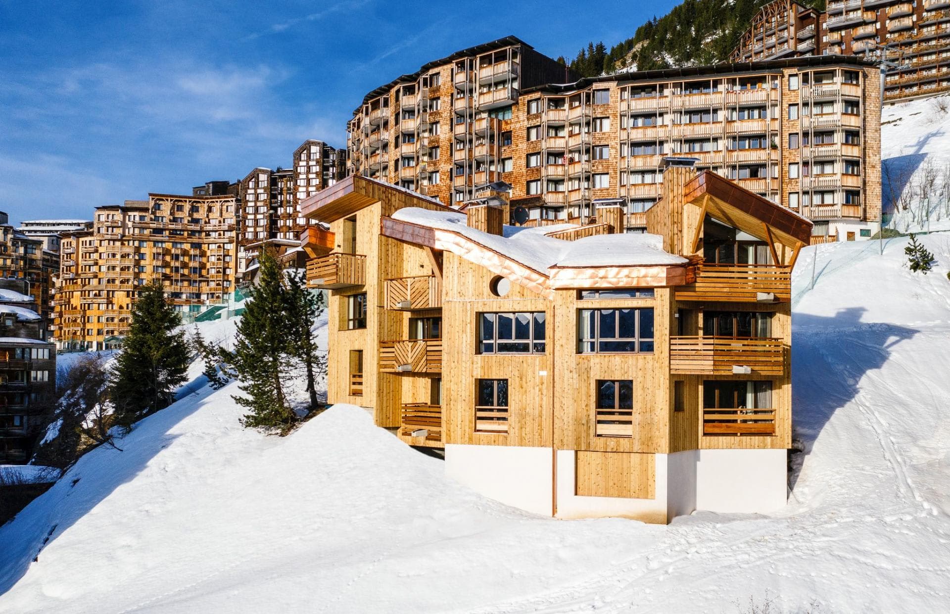Ski-in, ski-out timber chalet with private balconies and mountain views