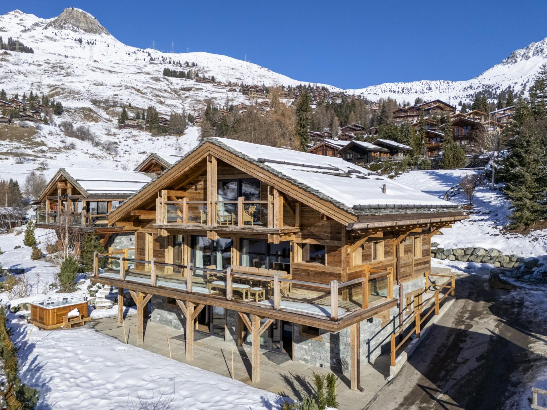 Ski-in chalet with wrap-around balcony and private outdoor hot tub