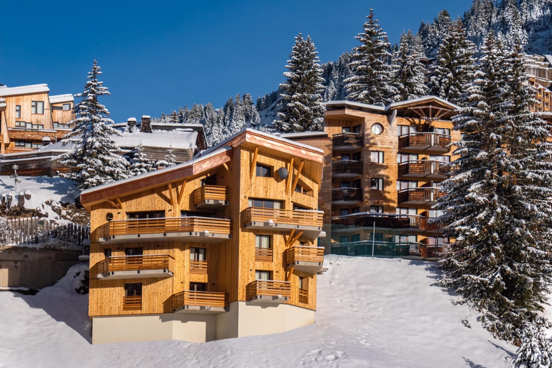 Ski-in ski-out chalet with private balconies and mountain views