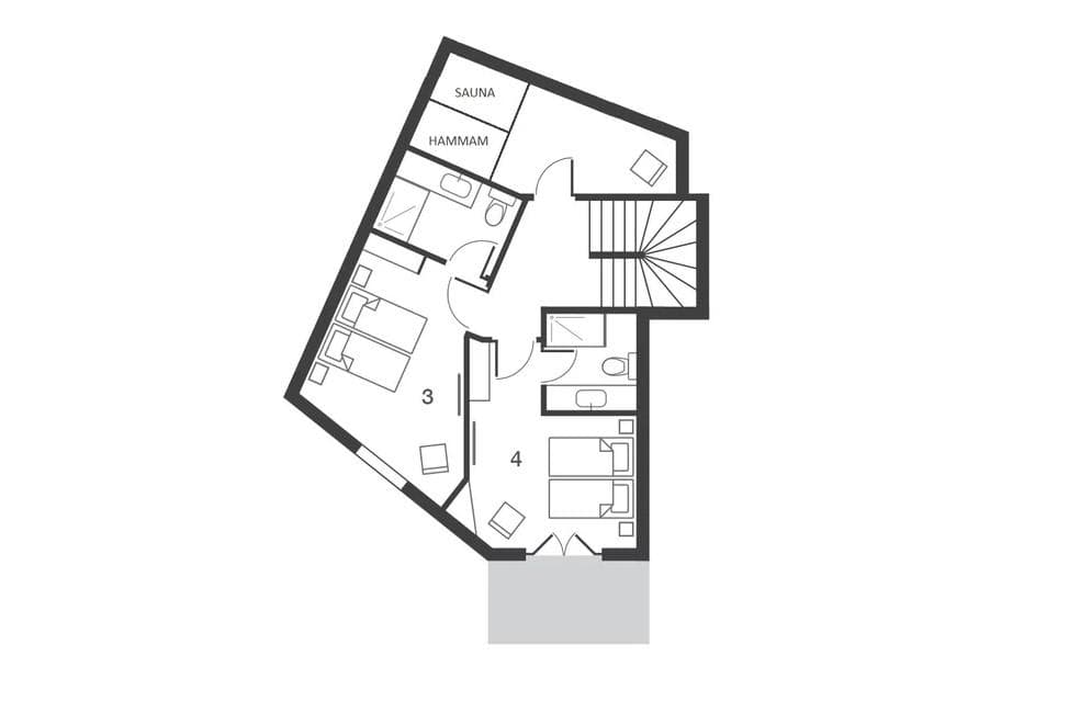 Lower floor plan: two bedrooms, two bathrooms, sauna, and hammam
