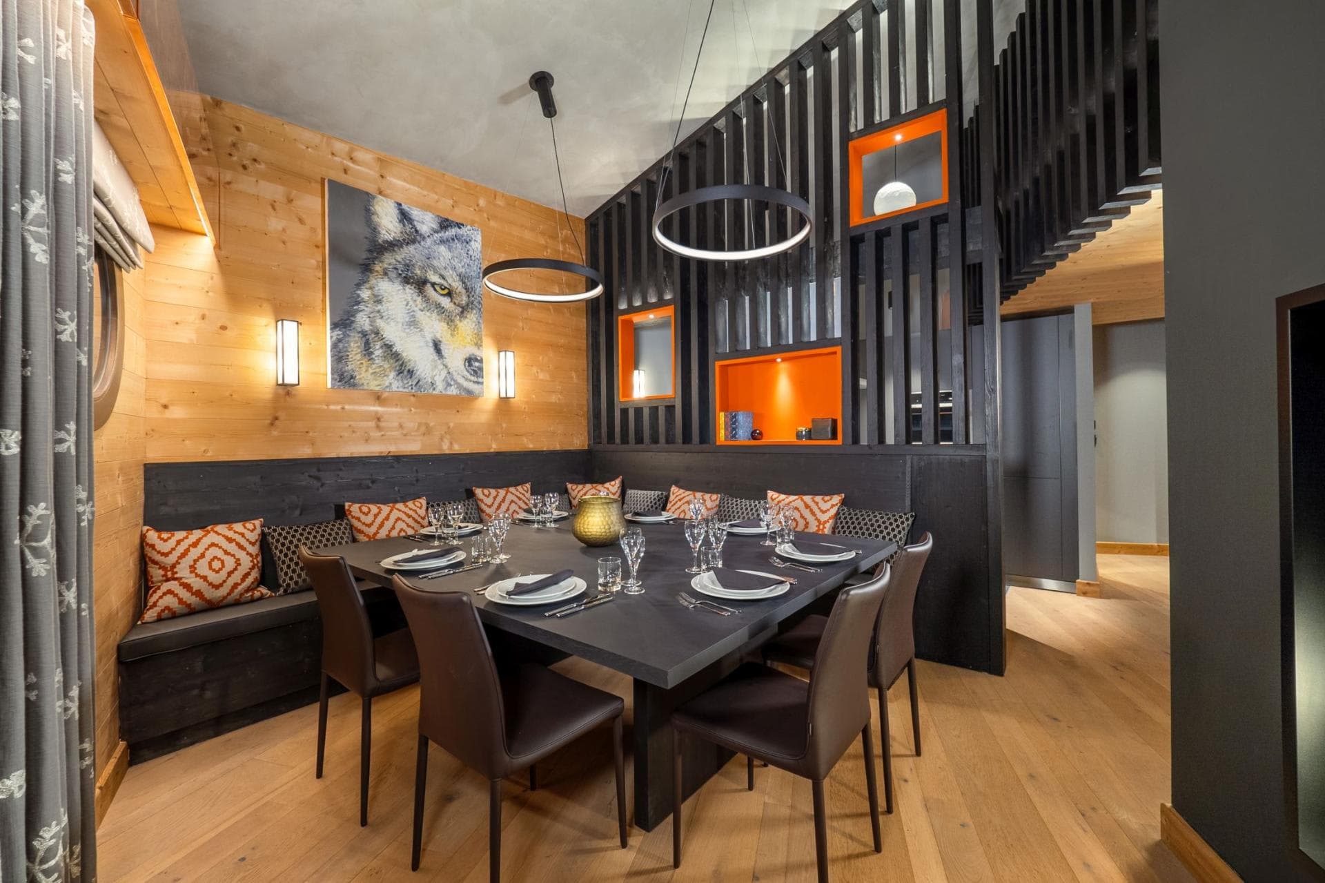 Dining area with booth and chair seating for 10 guests