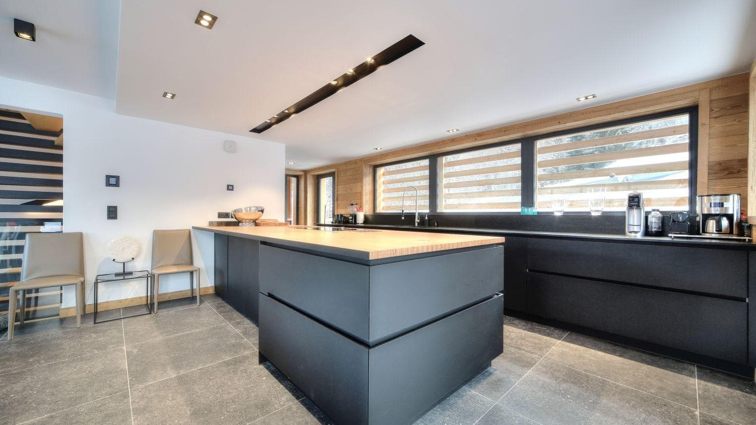 Kitchen island with induction cooktop and built-in espresso machine