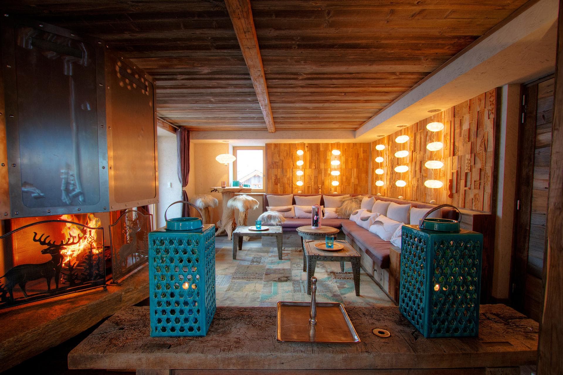 Lounge area with wood-burning fireplace and sectional seating for 10