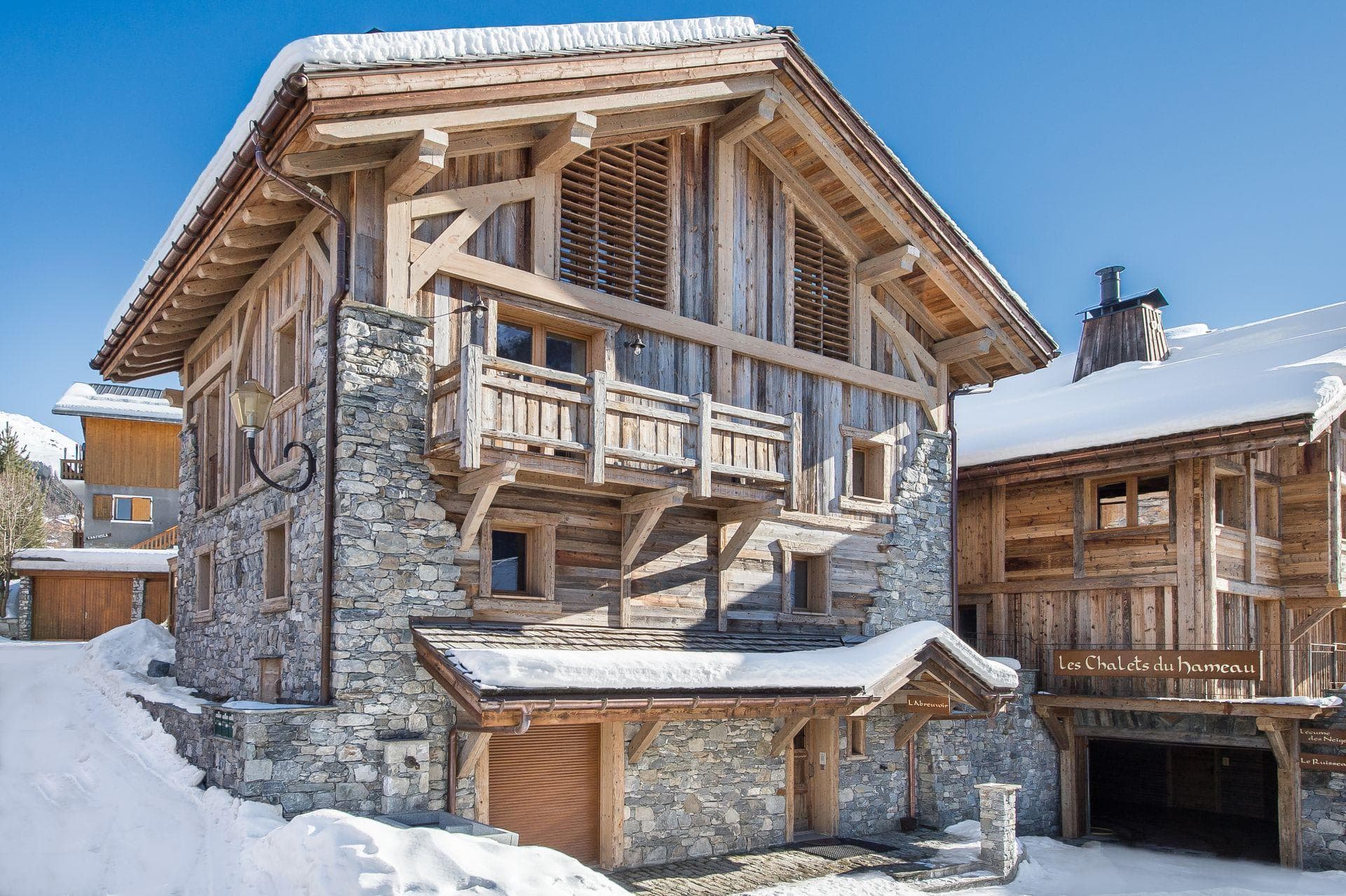 Stone and timber chalet with private balcony and heated garage entrance