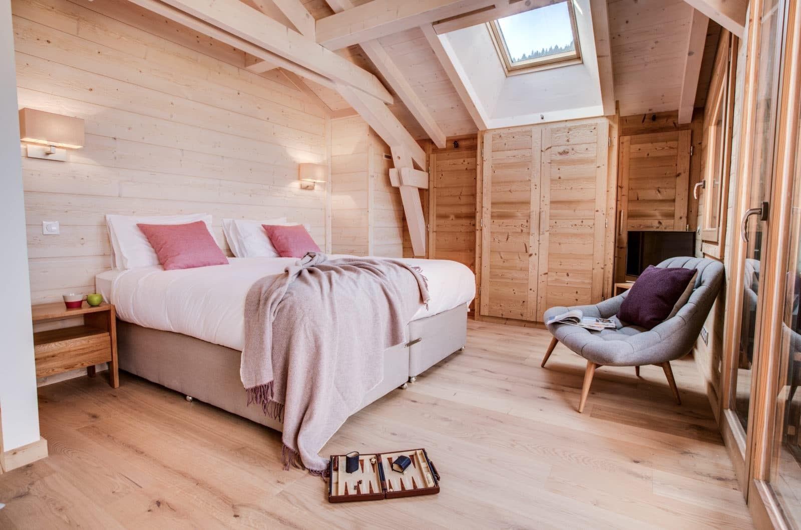 Bedroom with king bed and overhead skylight