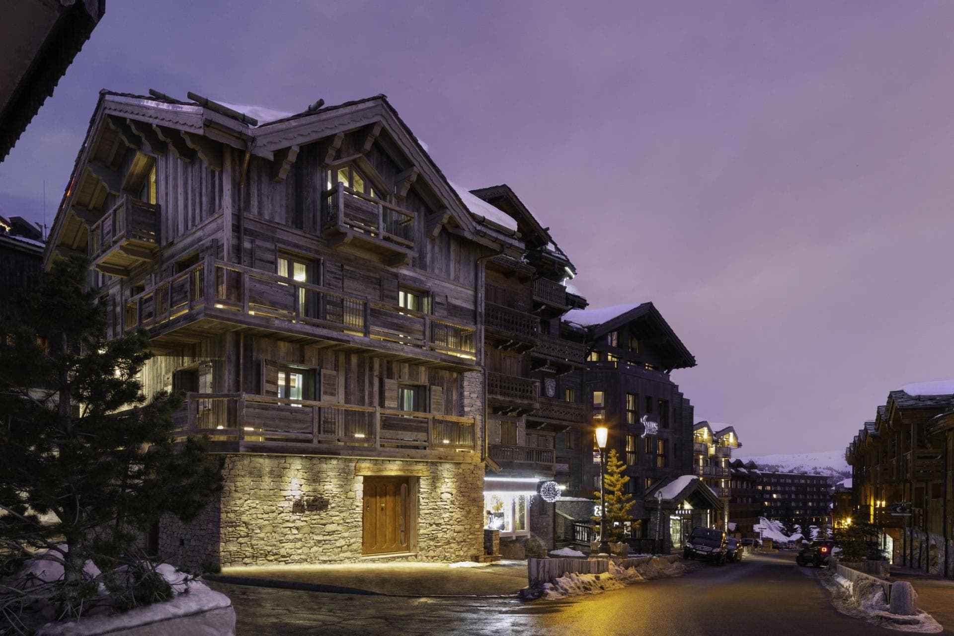 Ski-in chalet with wrap-around balconies and private stone entrance