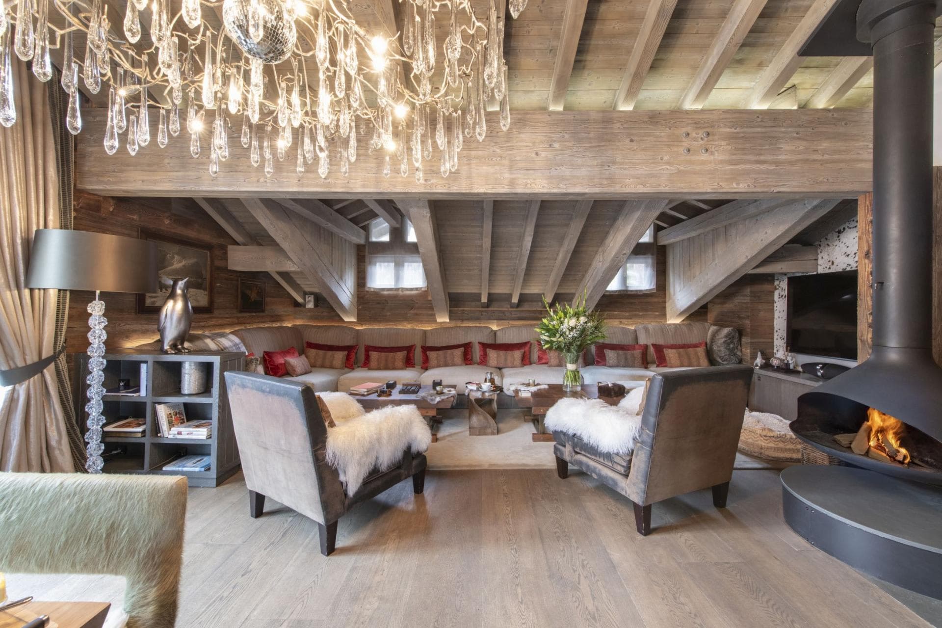 Living area with wood-burning fireplace and sectional seating for 10