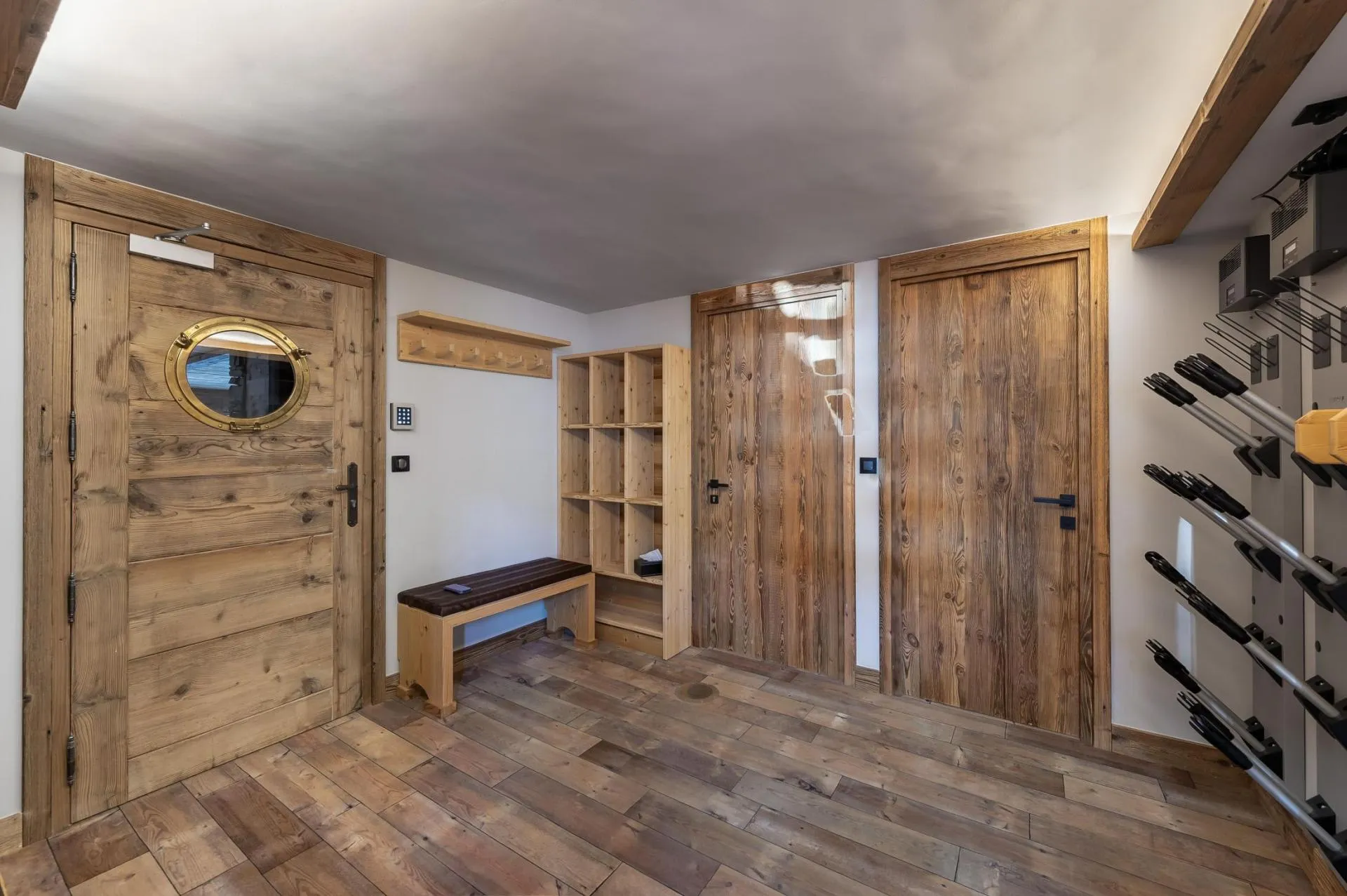 Ski room with storage benches and boot warmers