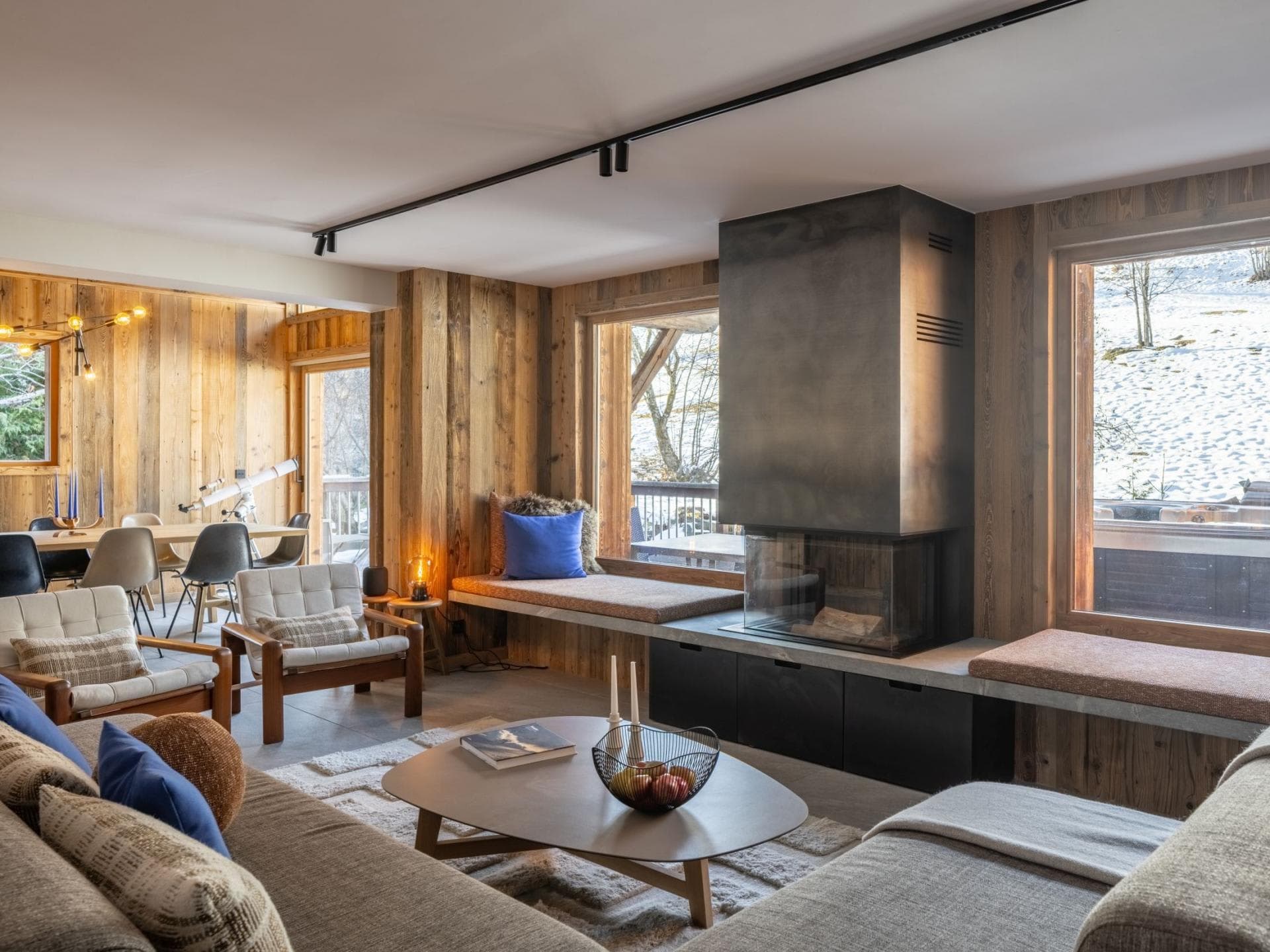 Living area featuring glass fireplace and built-in window seating