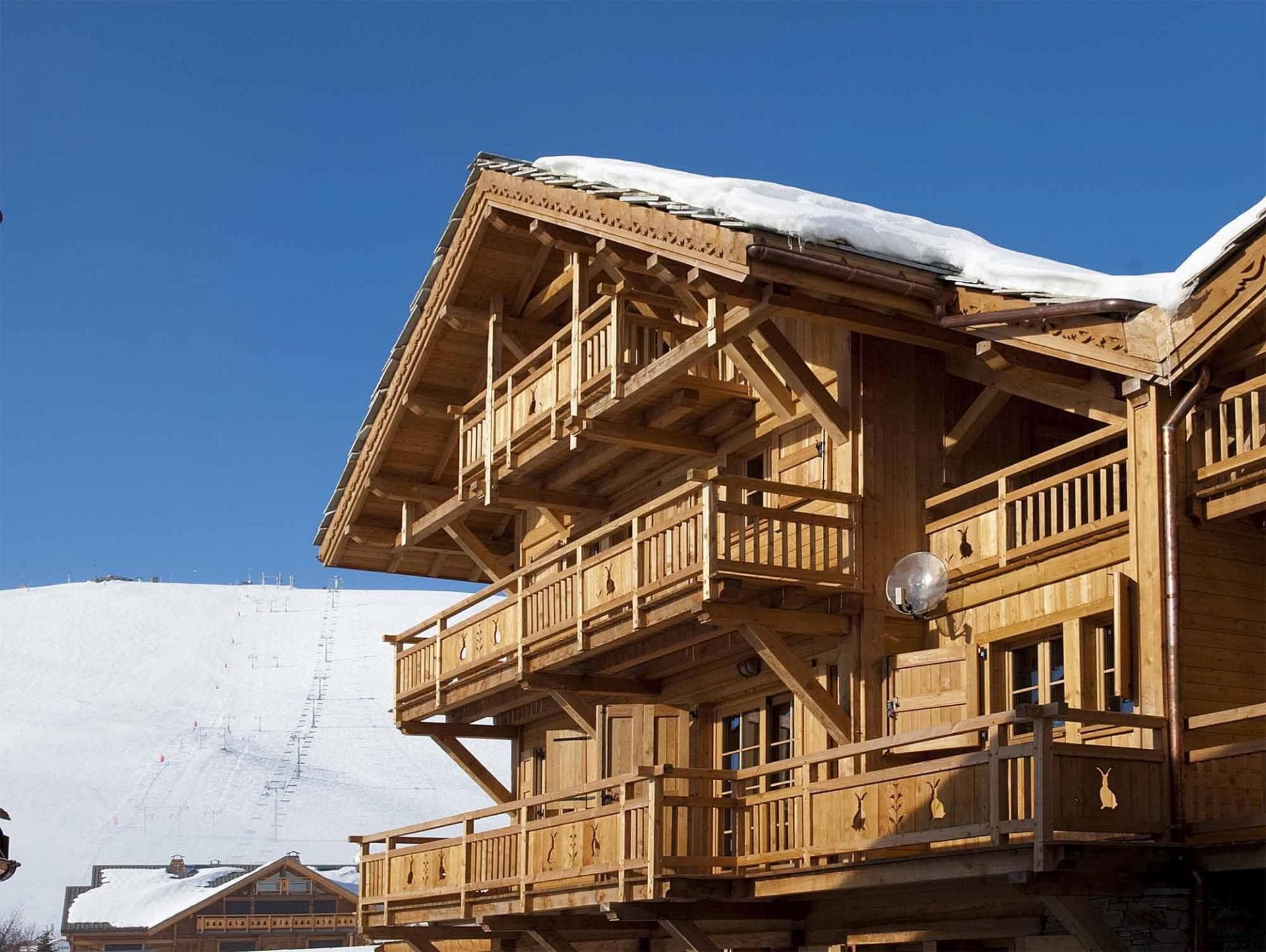 Ski-in/ski-out chalet with private balconies overlooking the slopes