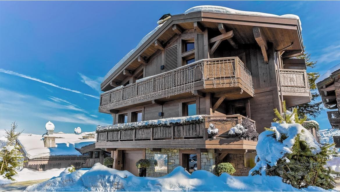 Ski-in chalet with private balconies and integrated garage