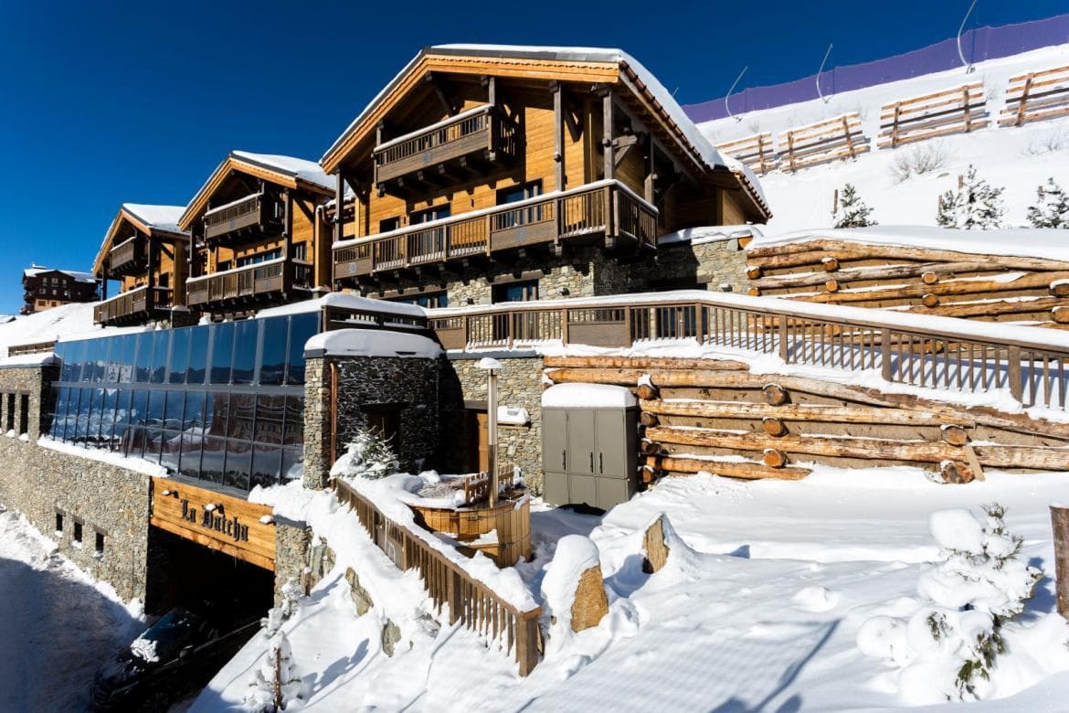 Ski-in/ski-out chalet with private balconies and wood-fired Nordic hot tub