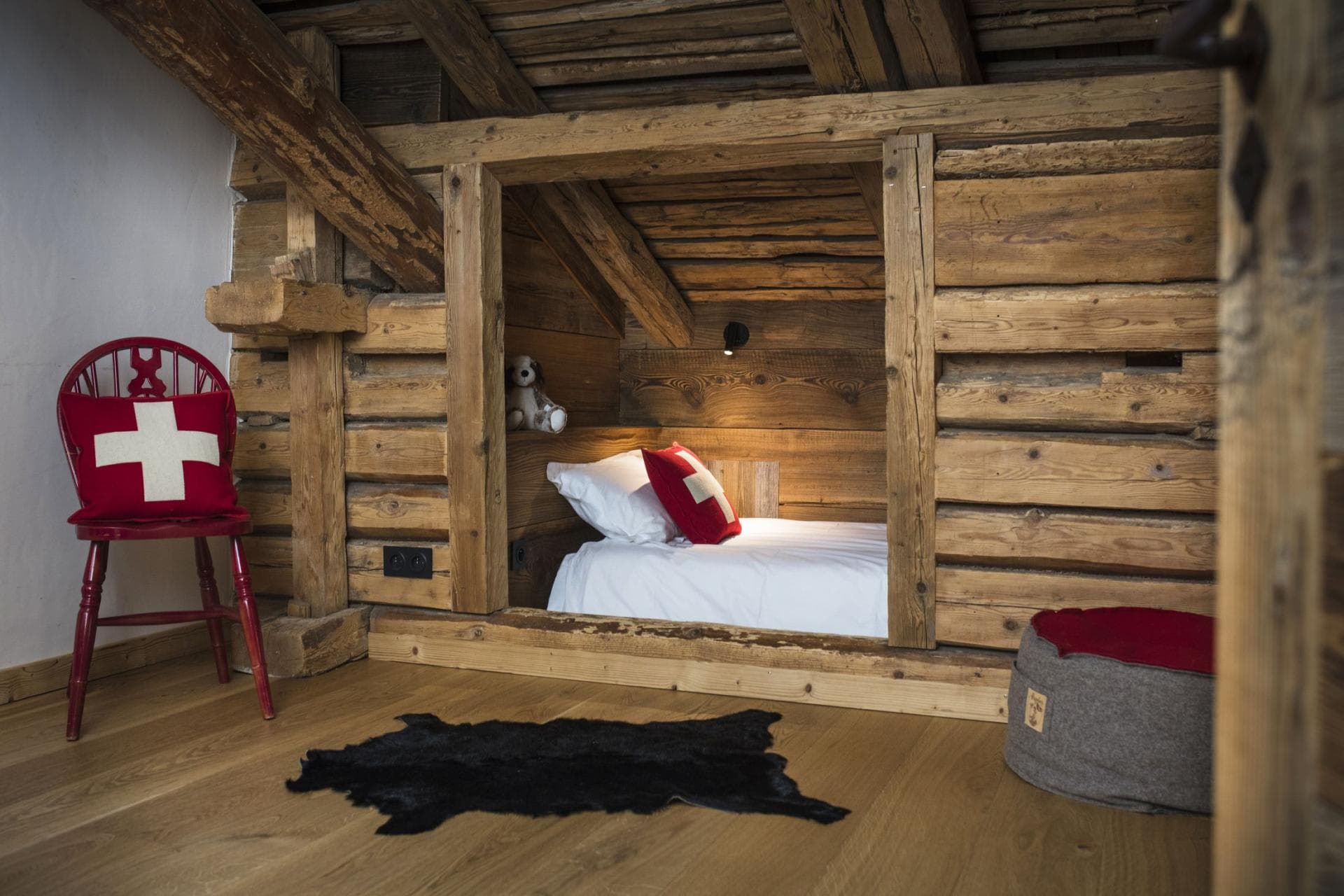 Alcove twin bed built into original reclaimed timber walls