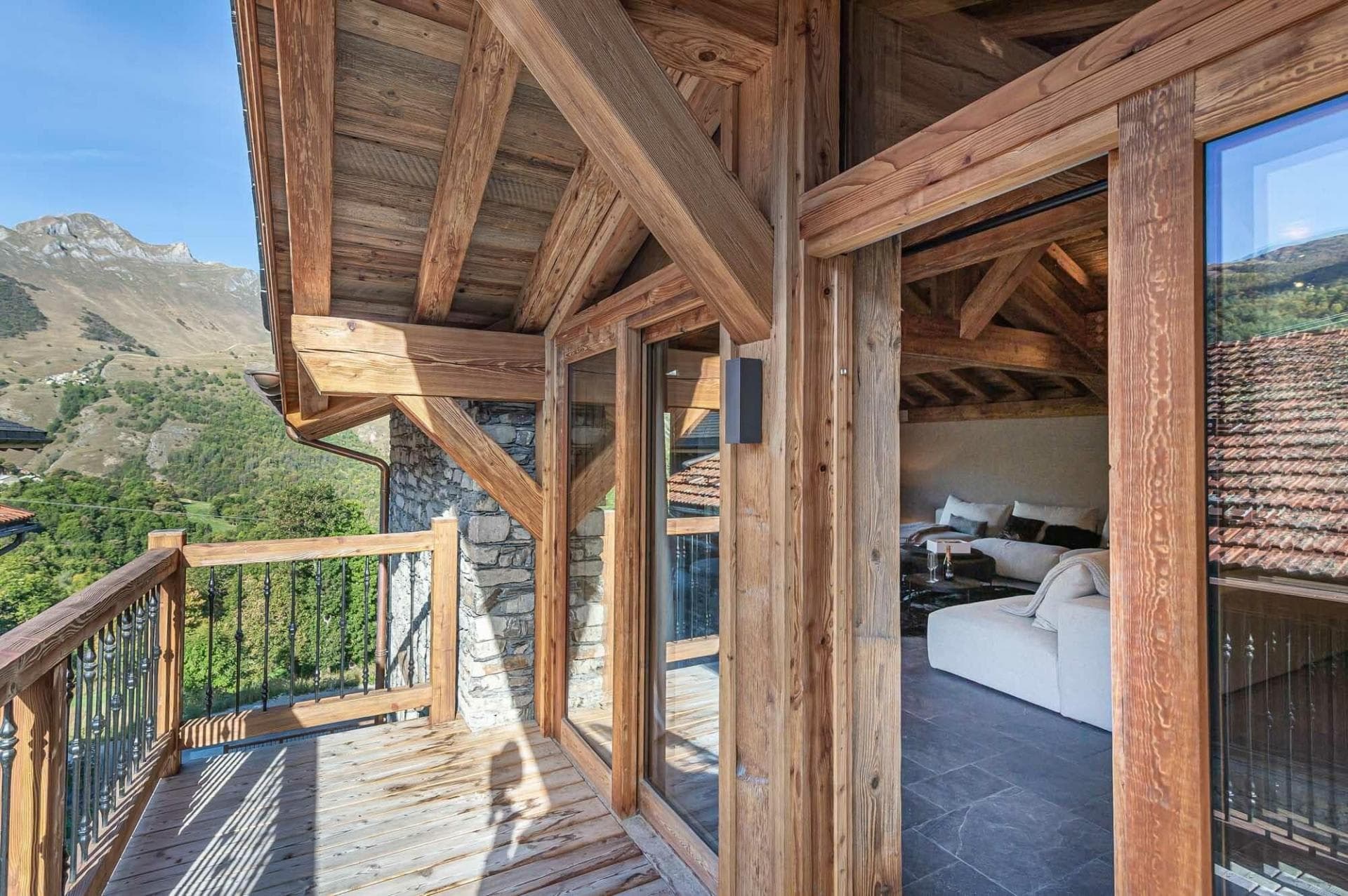 Private balcony with mountain views and exposed timber beams