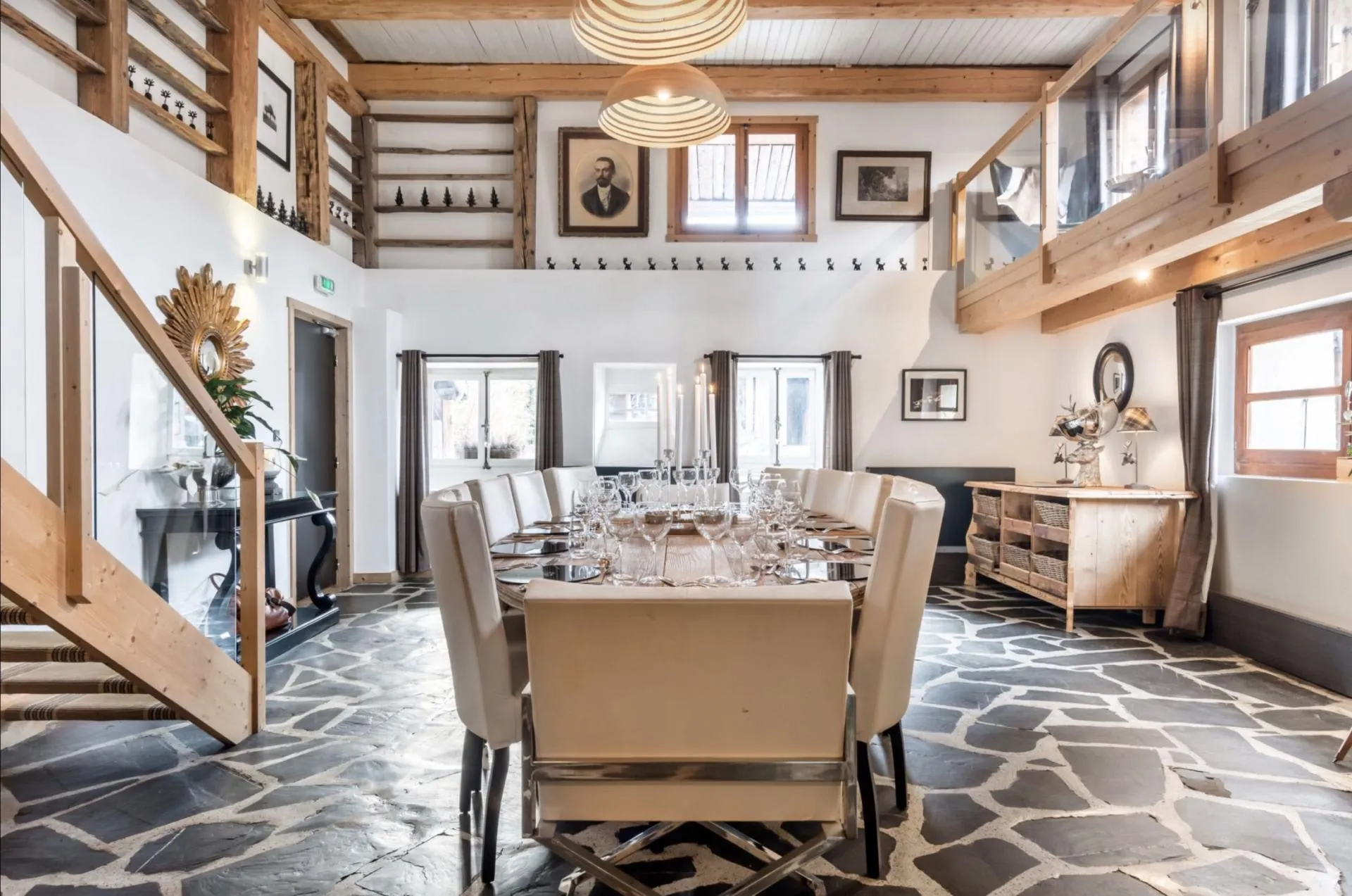 Dining room with flagstone floor and long dining table