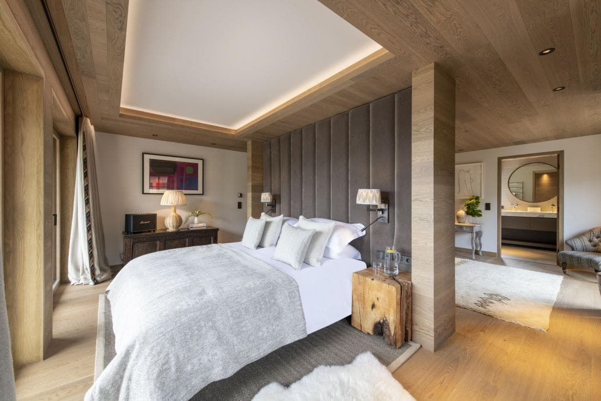 Primary bedroom with king bed and ensuite bathroom