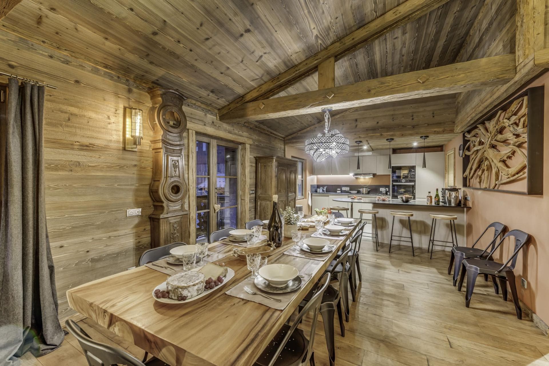 Dining area seats 10; open-plan layout connects to kitchen with breakfast bar