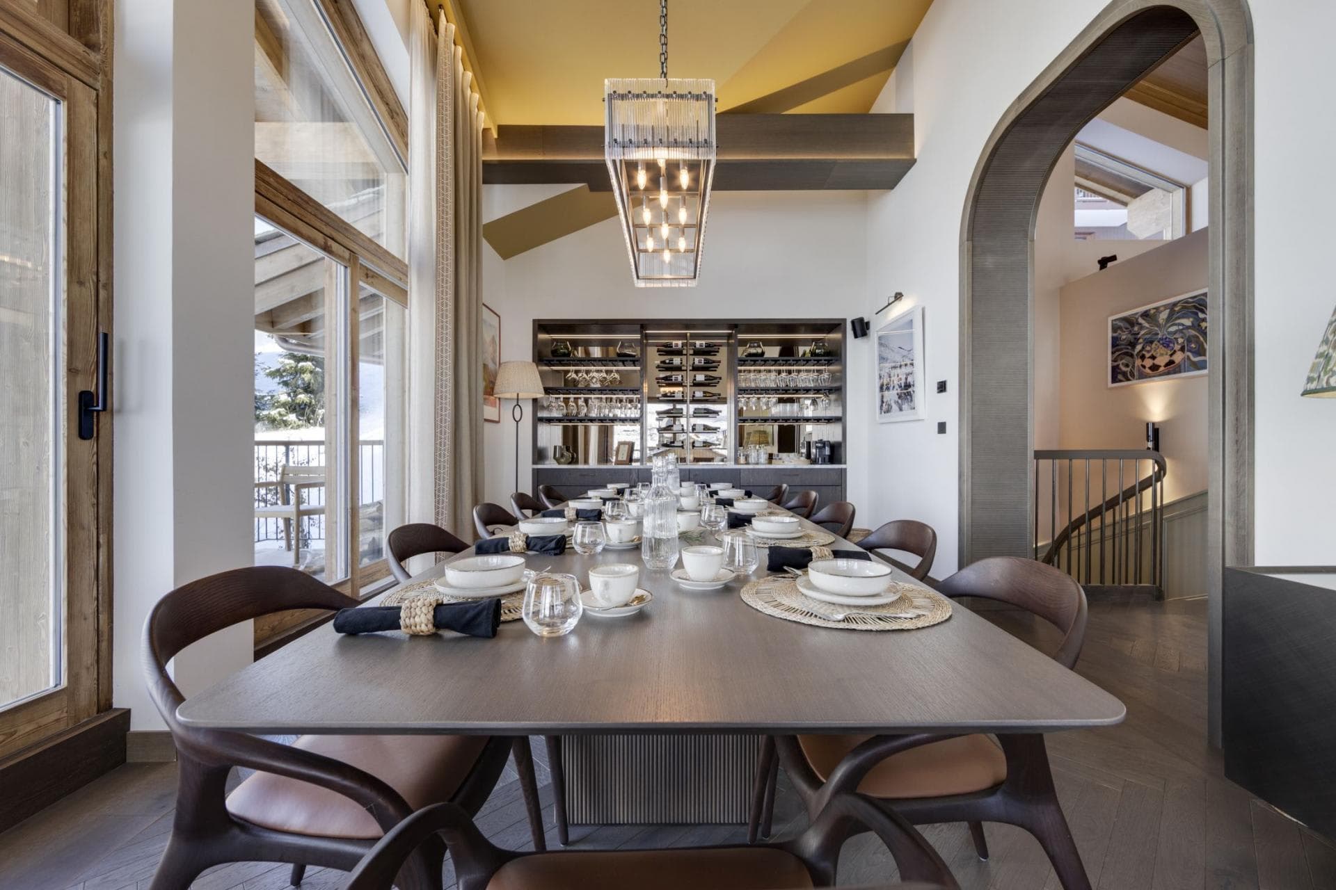 Dining table seats 10; built-in wine display and terrace access