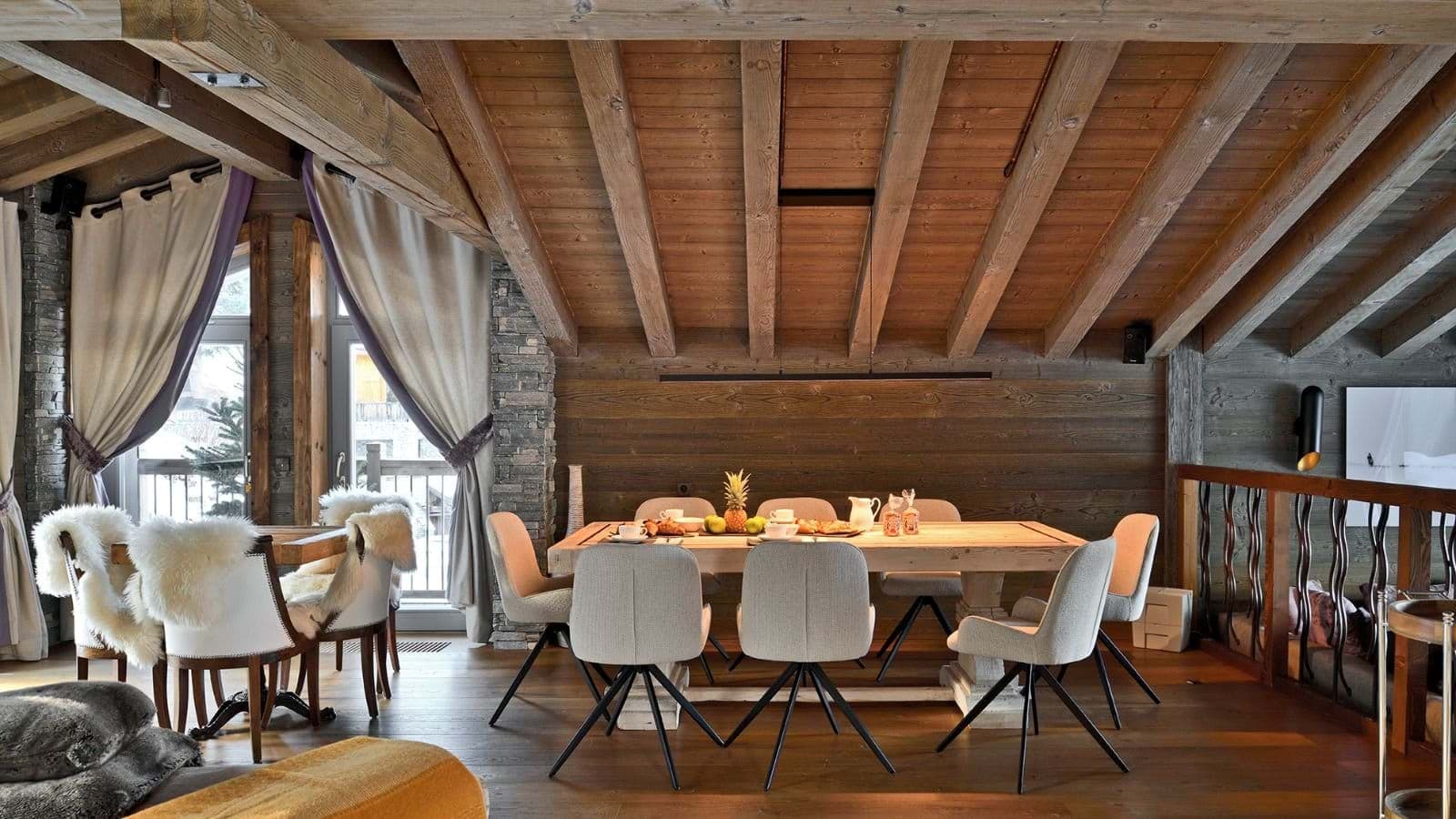 Dining area with seating for 8 and balcony access