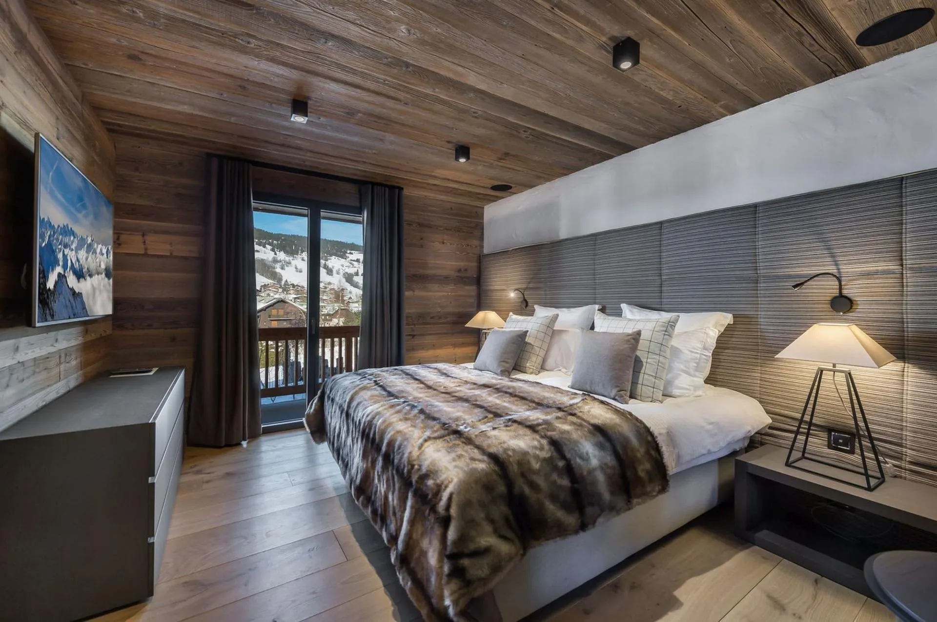 Double bedroom beside glazed doors