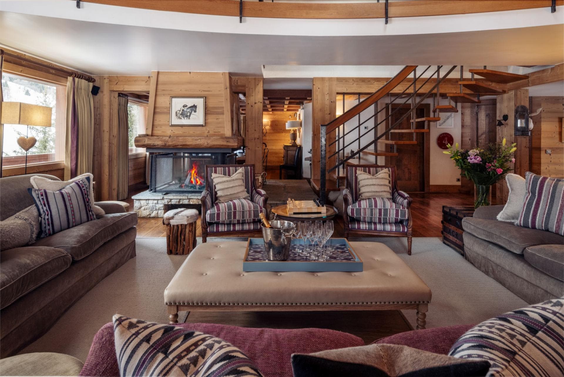 Living area with wood-burning fireplace and seating for 8