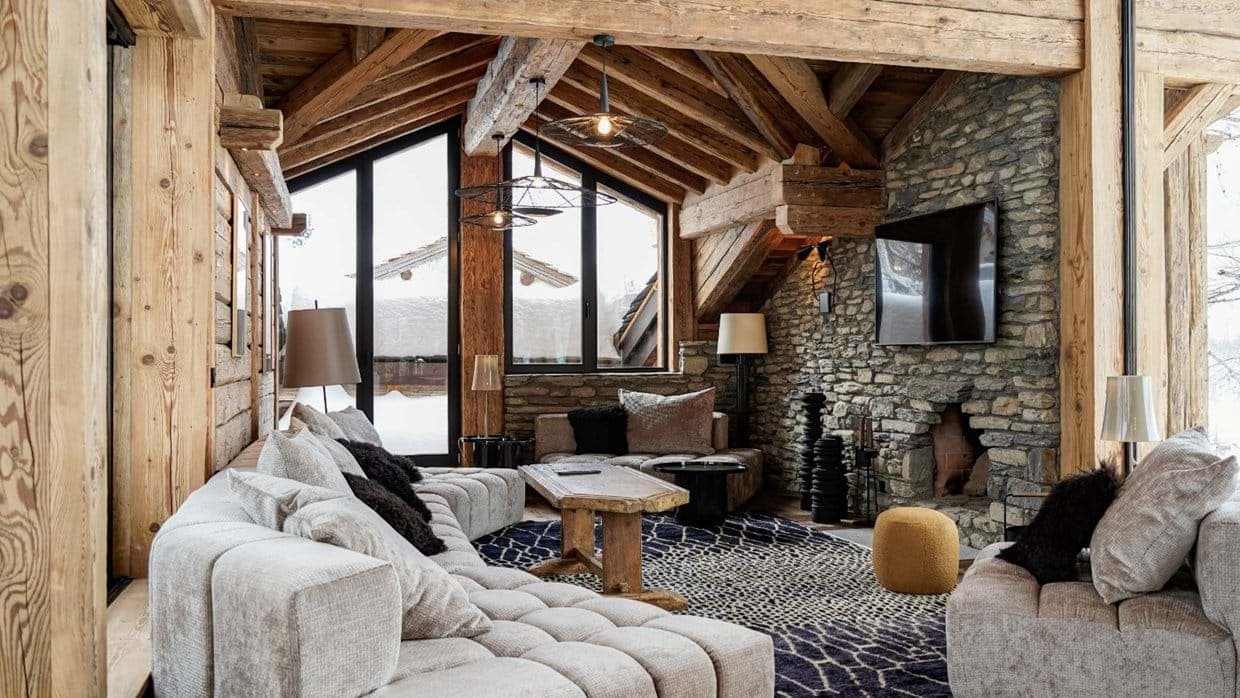 Living area with wood-burning fireplace and sectional seating for 8