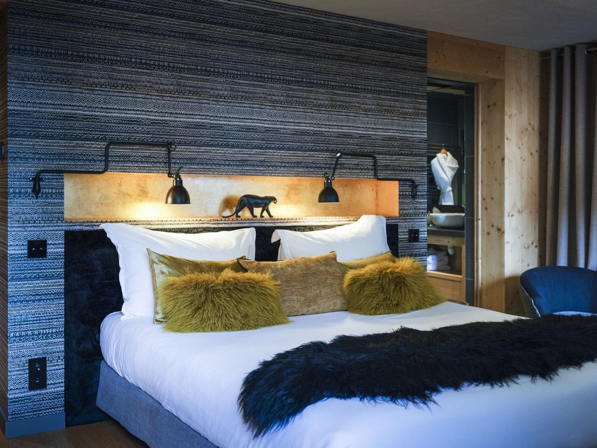 Primary bedroom with king bed and ensuite bathroom access