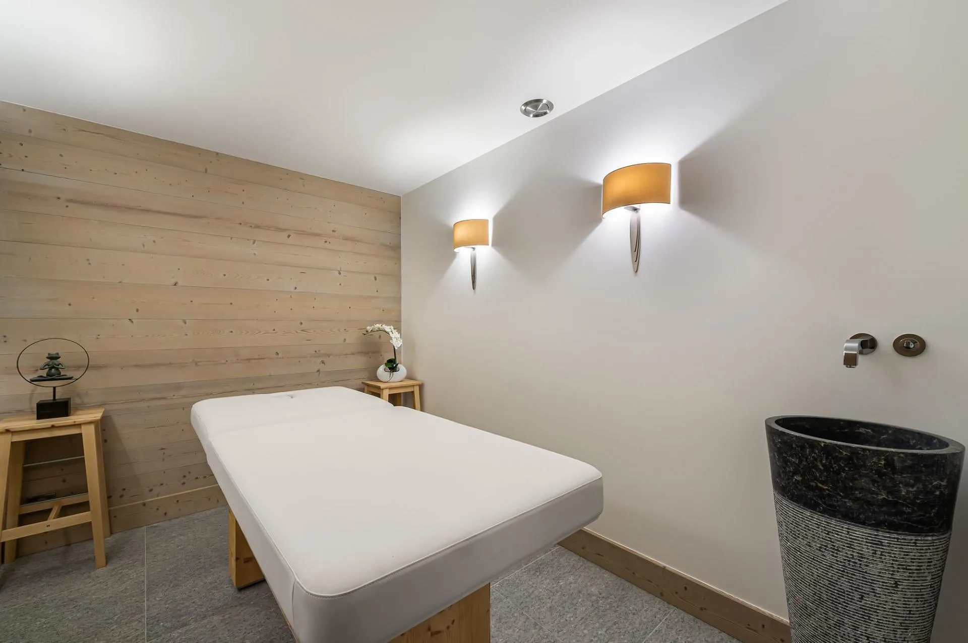Dedicated massage room with treatment table