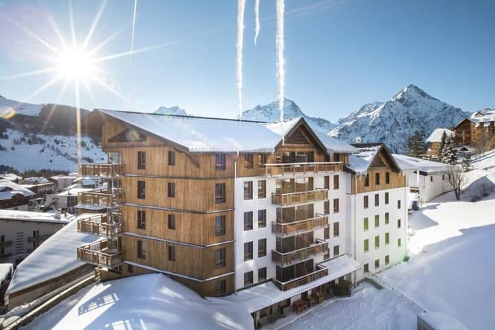 Chalet exterior with private balconies and mountain views