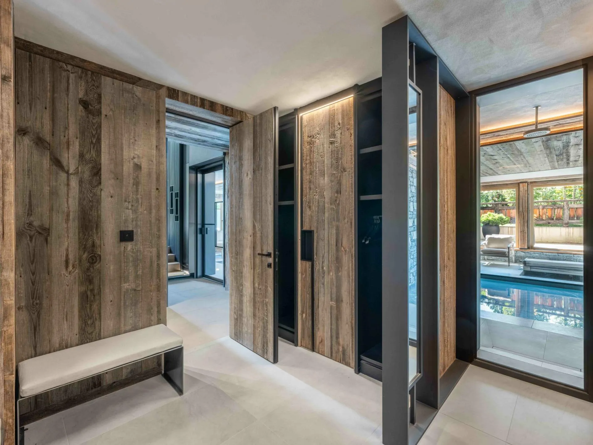 Timber-lined hallway beside the indoor pool