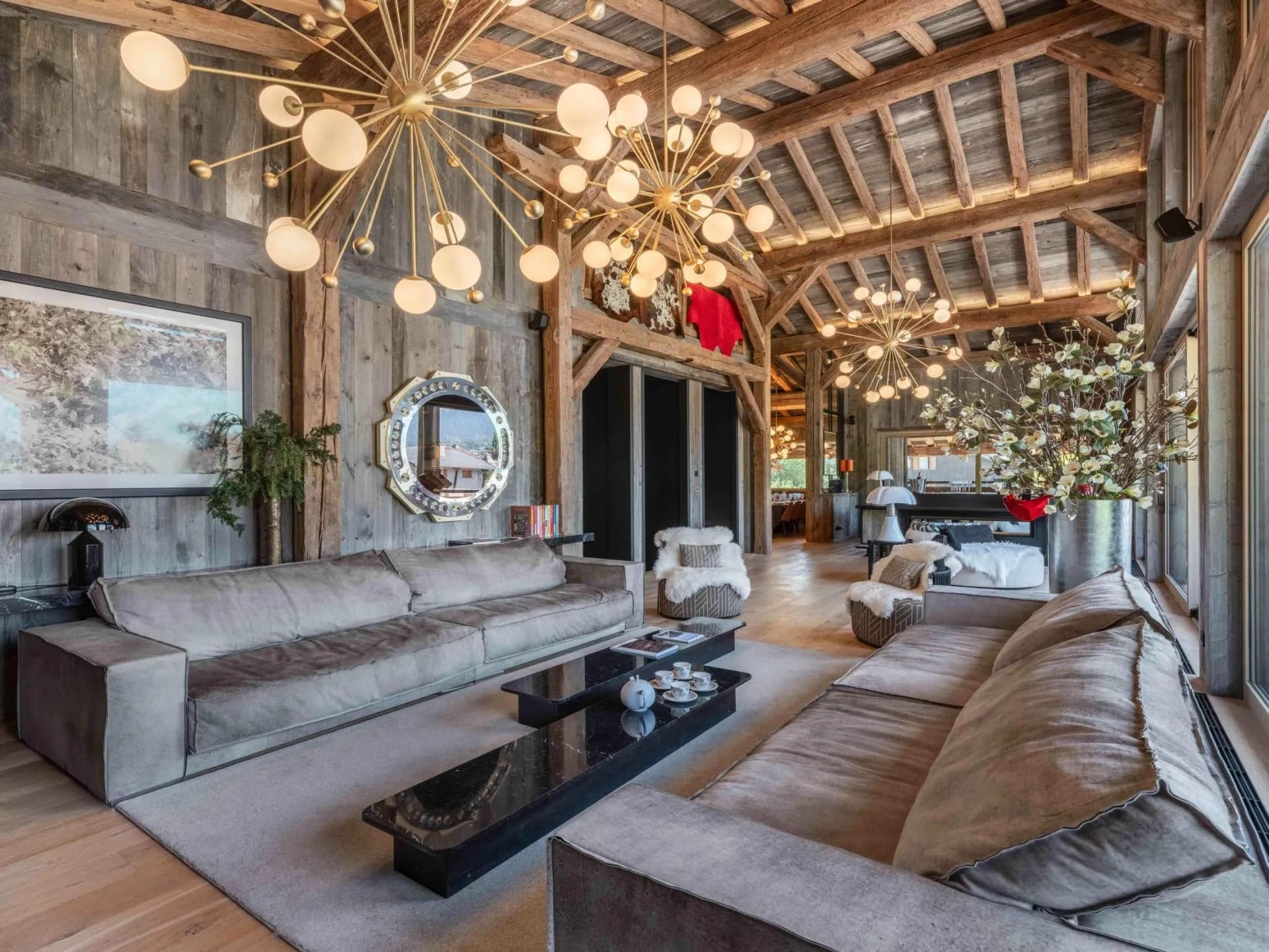 Sofas beneath exposed timber beams