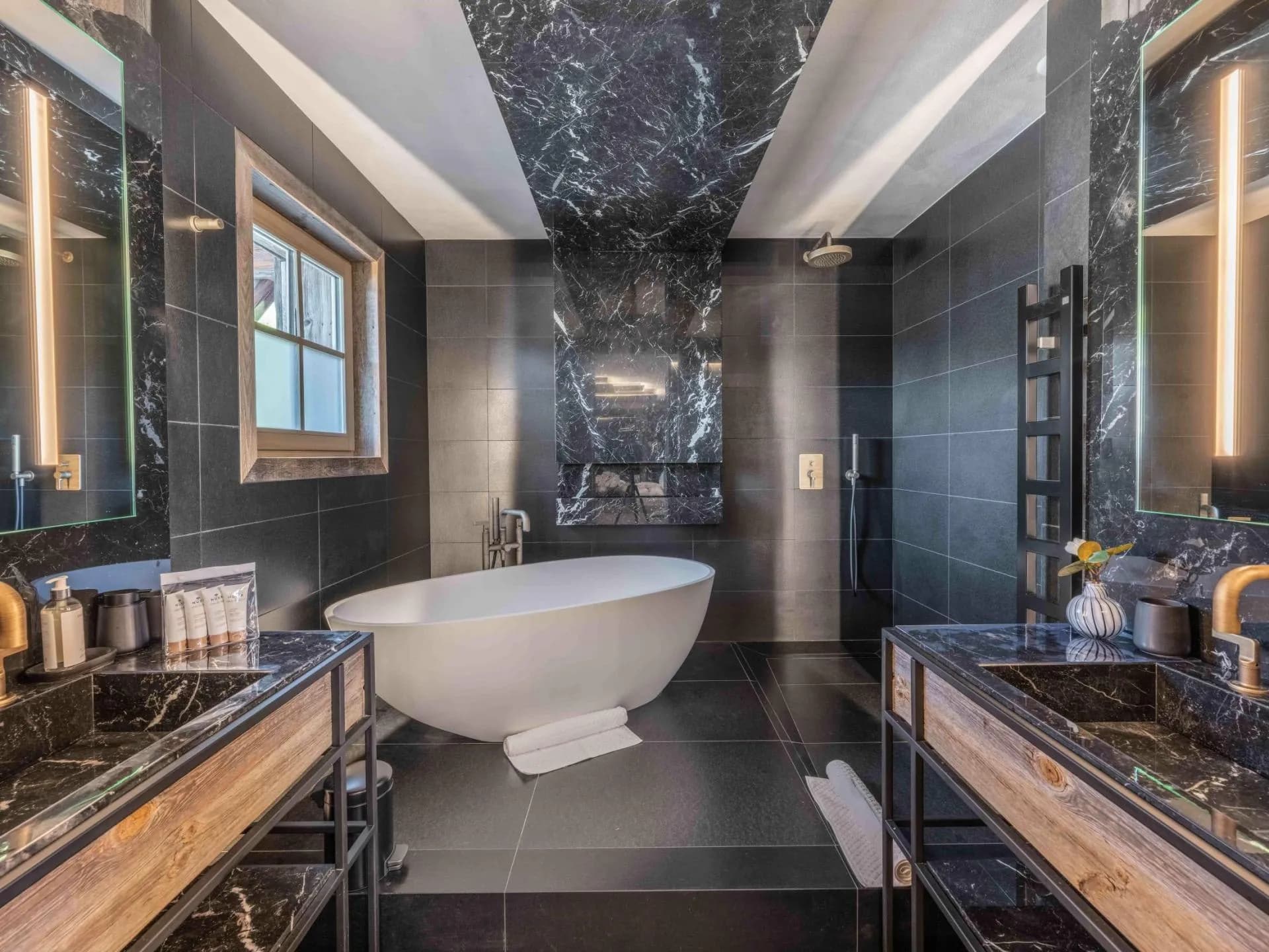 Bathroom with freestanding bath, vanity and shower